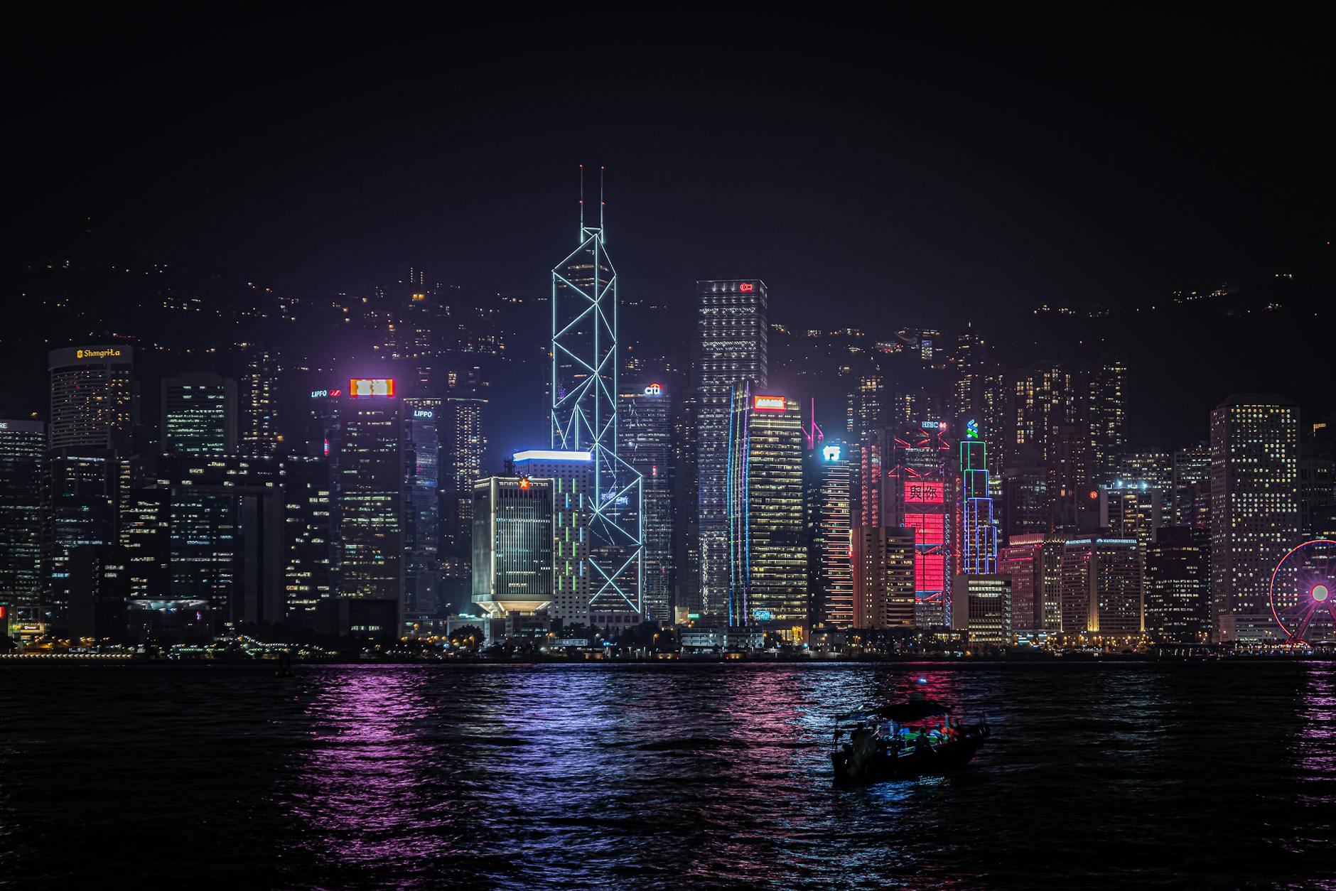Central Hong Kong night skyline and trade-show trip planning context.