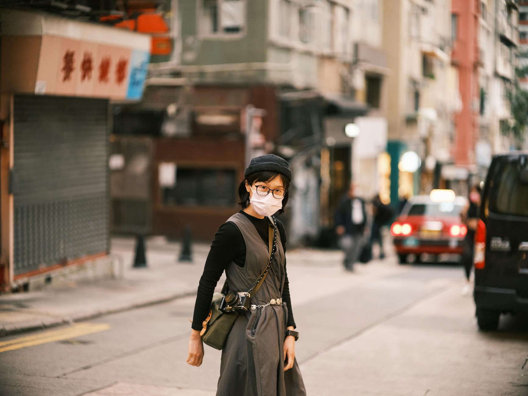 Central Hong Kong woman traveler and street-planning context.