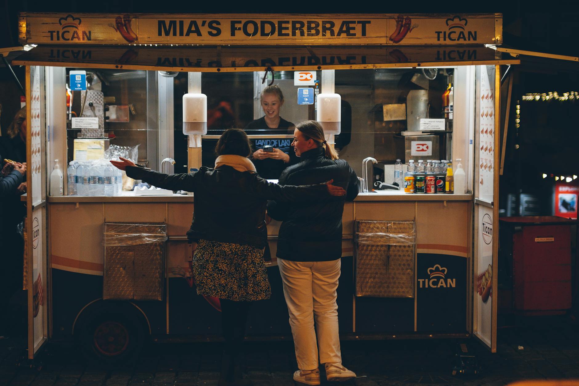 Food stand in Copenhagen for budget meal planning.