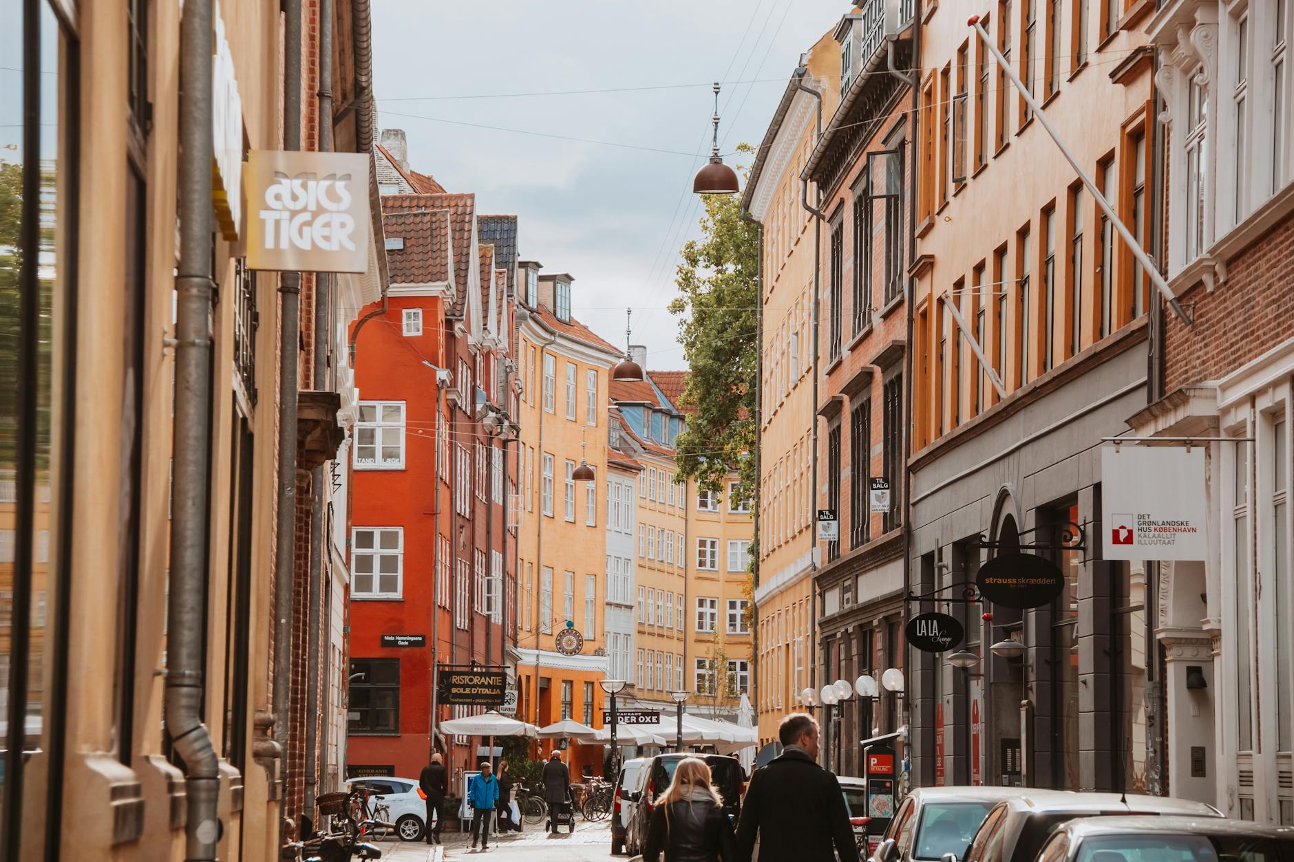 Colorful Copenhagen street for short-term budget travel planning.