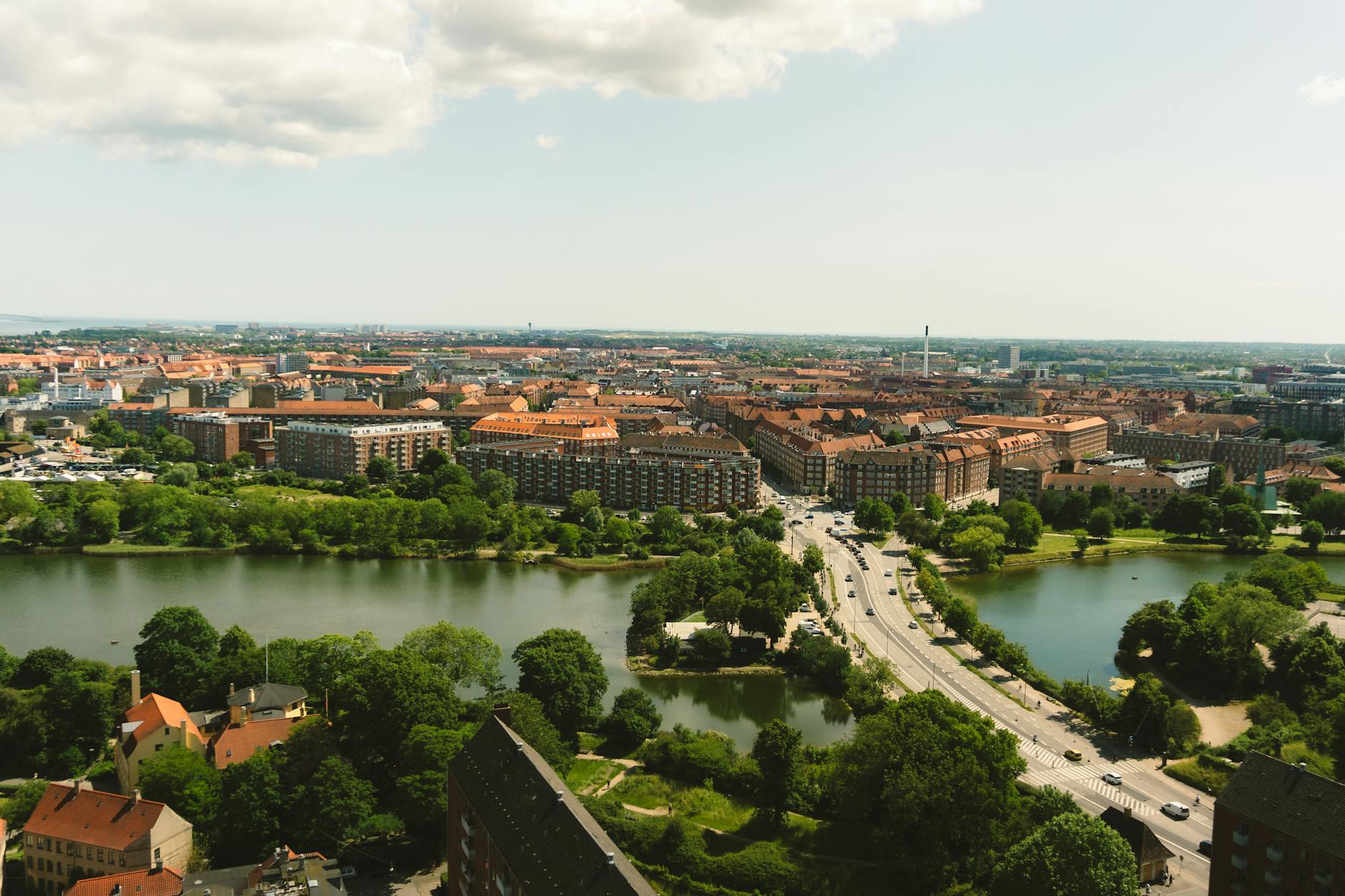 Copenhagen cityscape with lakes and greenery for free outdoor planning.