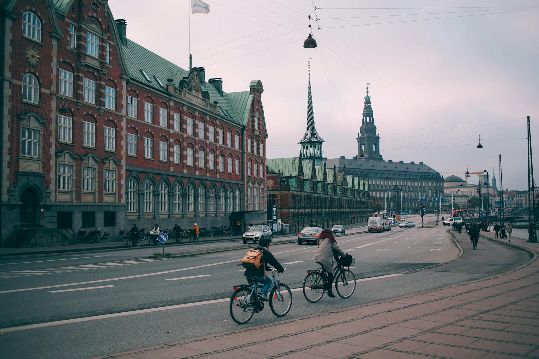 Cyclists on a Copenhagen embankment for budget bike planning.