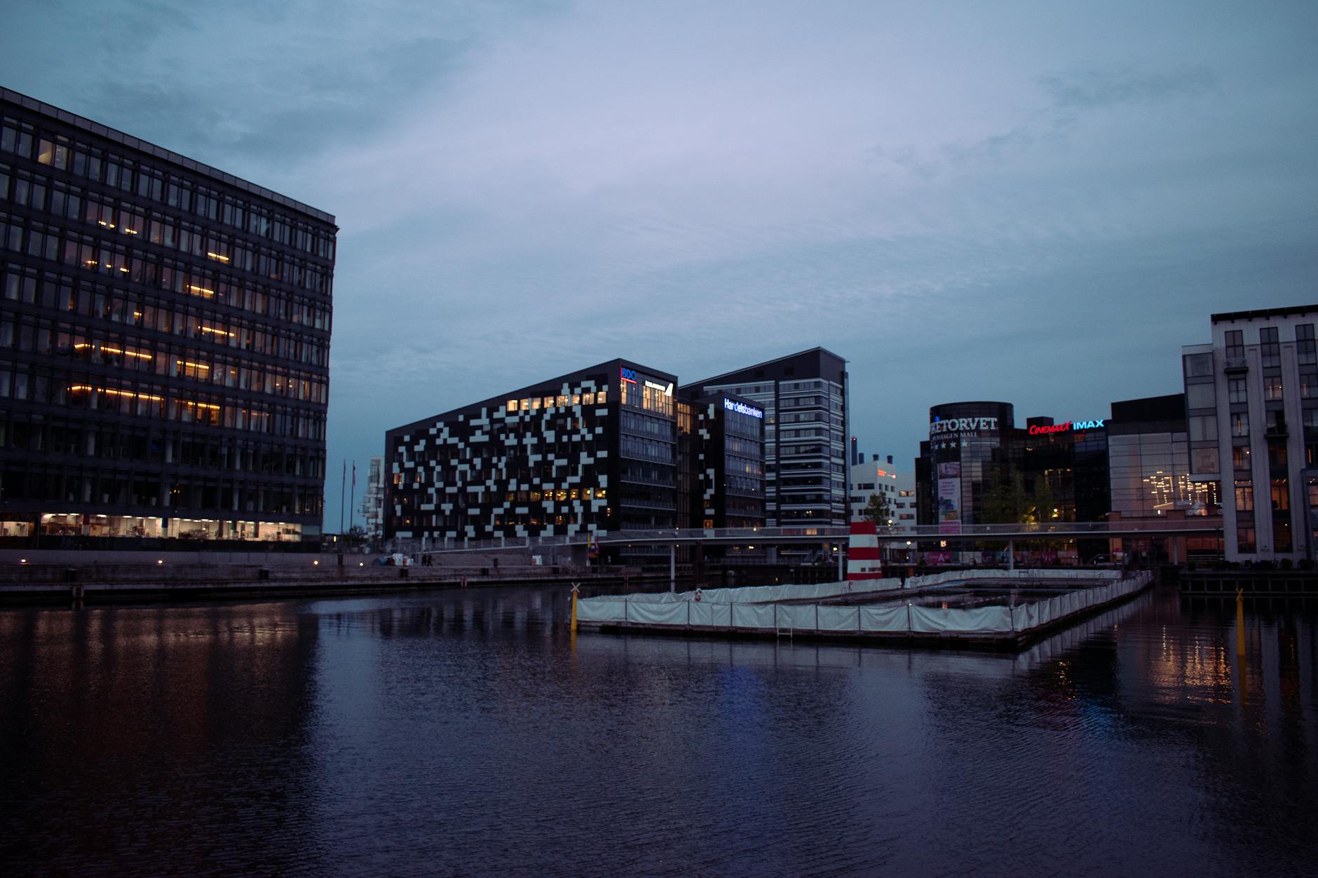 Modern Copenhagen harbor architecture for business travel planning.