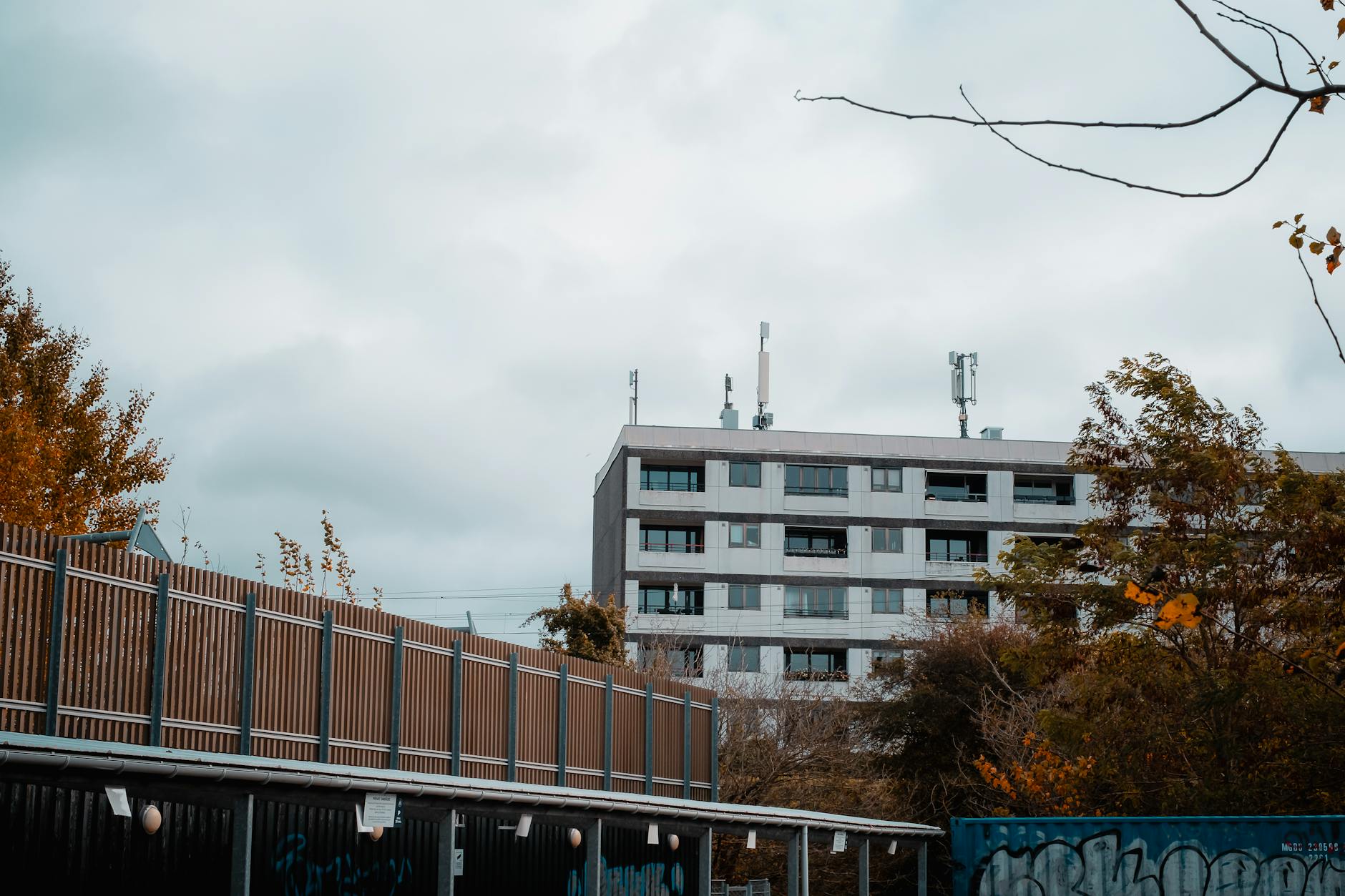 Modern Copenhagen building for content creator departure planning.