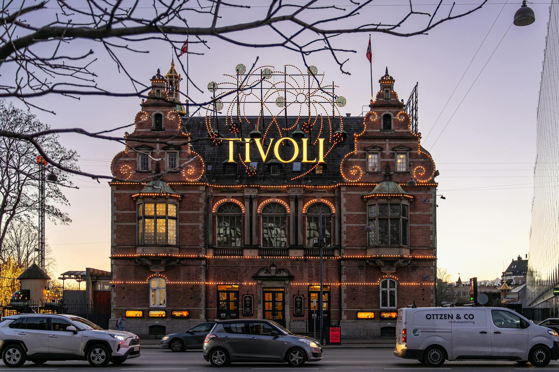 Tivoli Gardens illuminated facade in Copenhagen for night content planning.