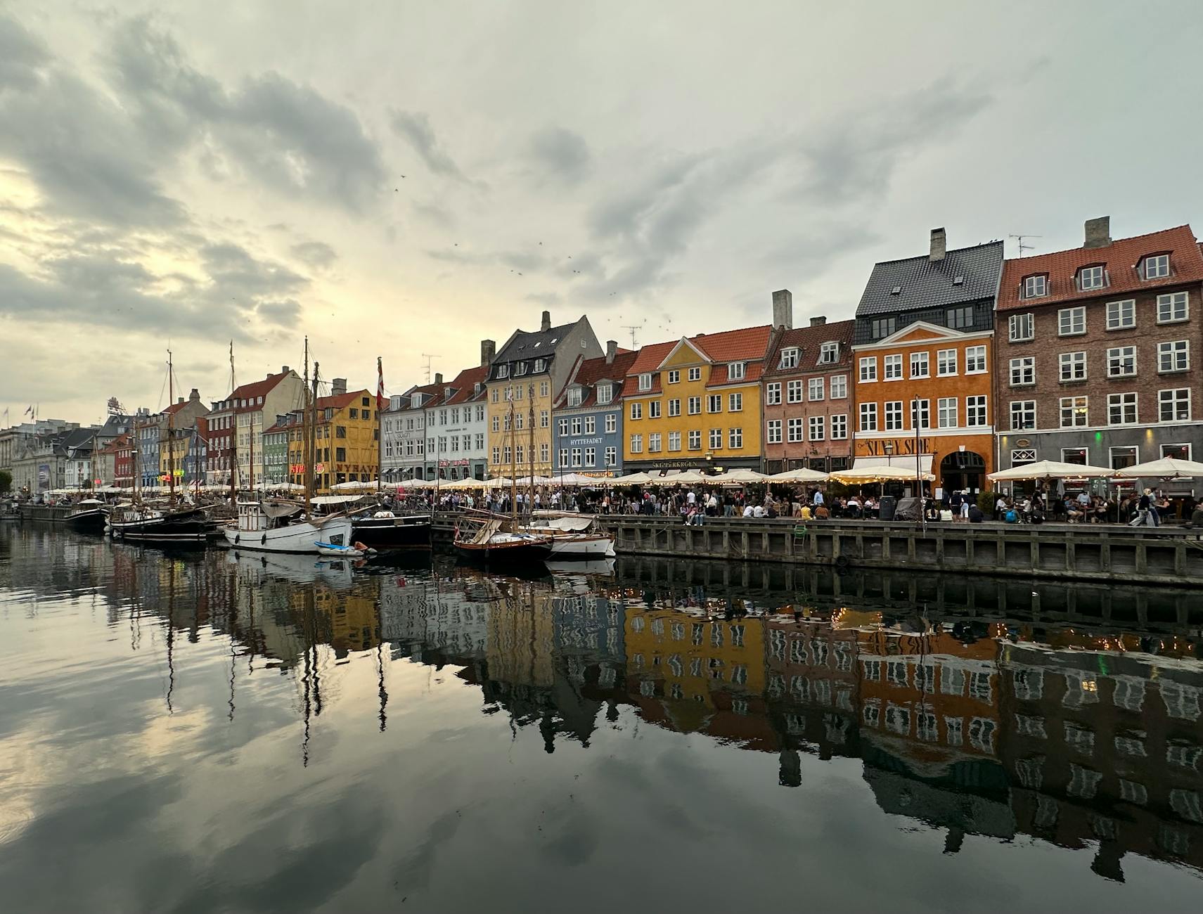 Evening Nyhavn in Copenhagen for deal-team debrief planning.