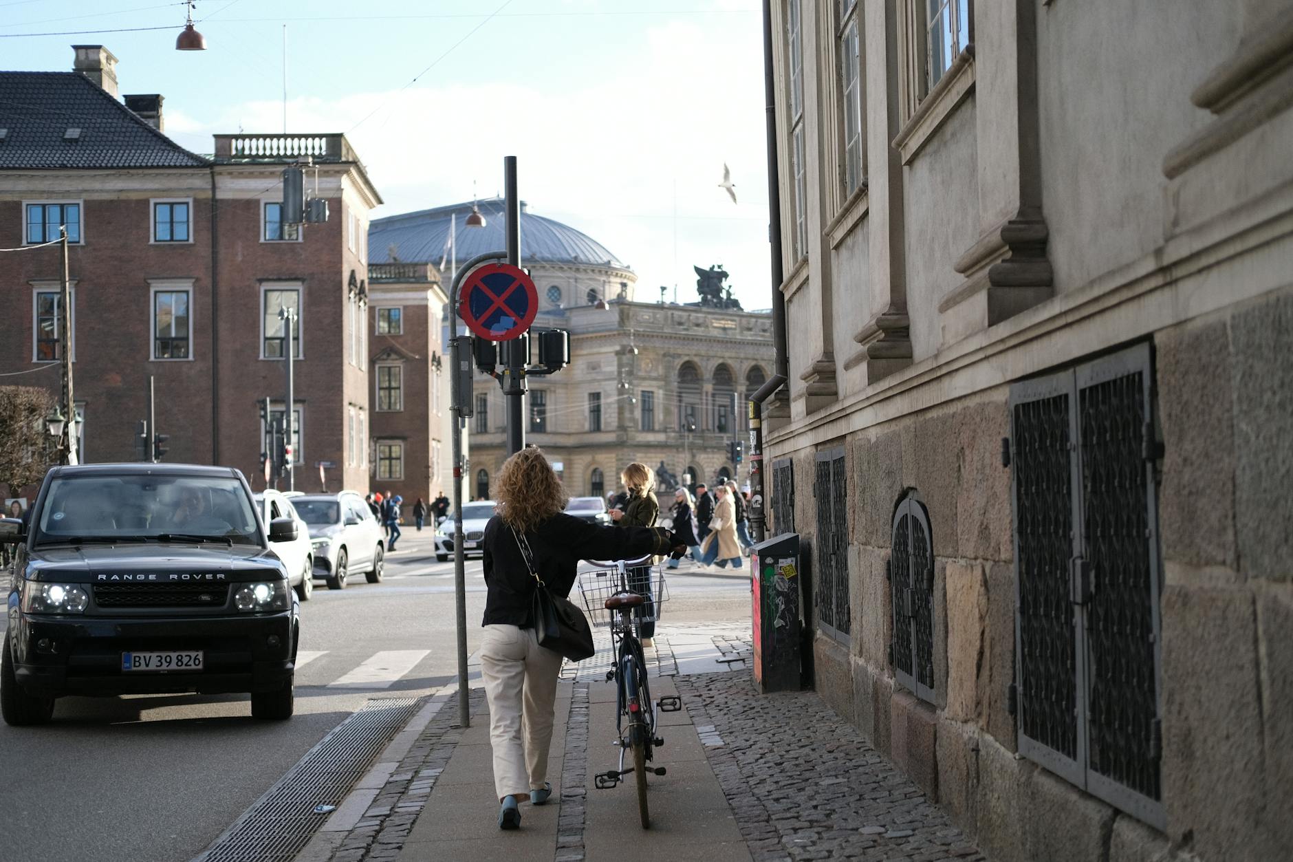 Copenhagen street scene for journalist reporting route planning.