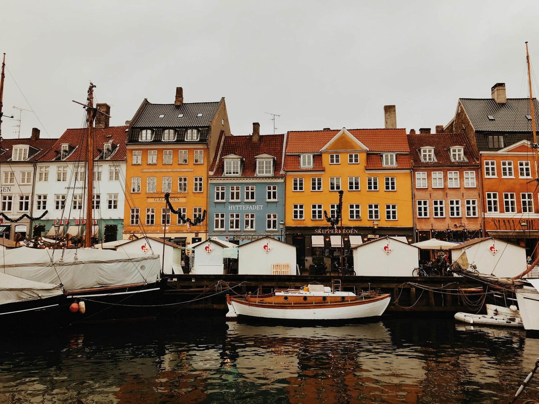 Nyhavn harbor in Copenhagen for luxury travel planning.