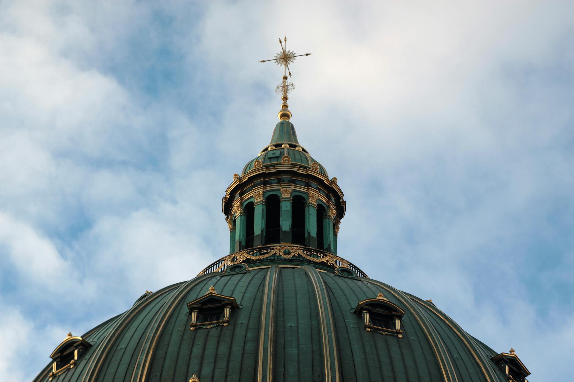 Frederiks Church dome in Copenhagen for religious travel planning.