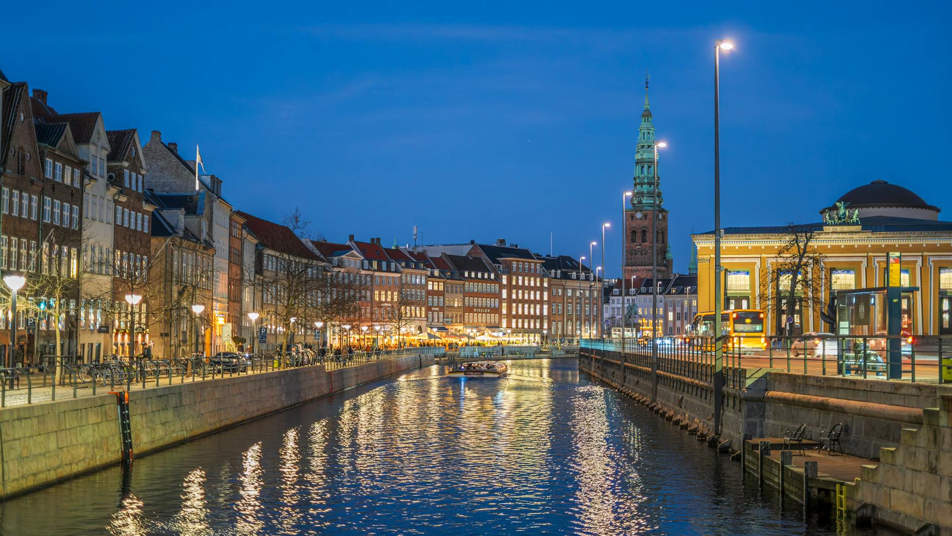 Copenhagen canal at night for quiet reflection planning.