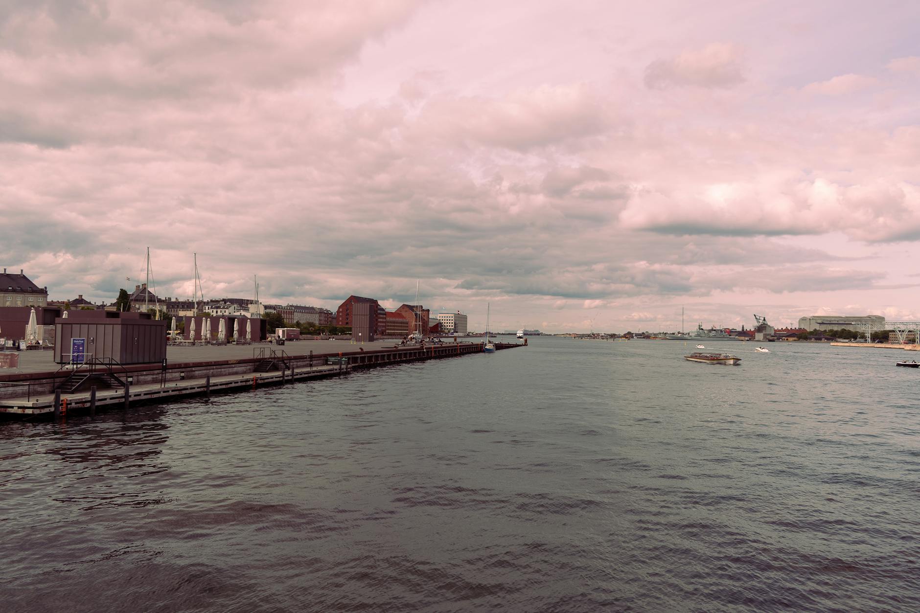 Cloudy Copenhagen harbor for repeat visitor waterfront planning.