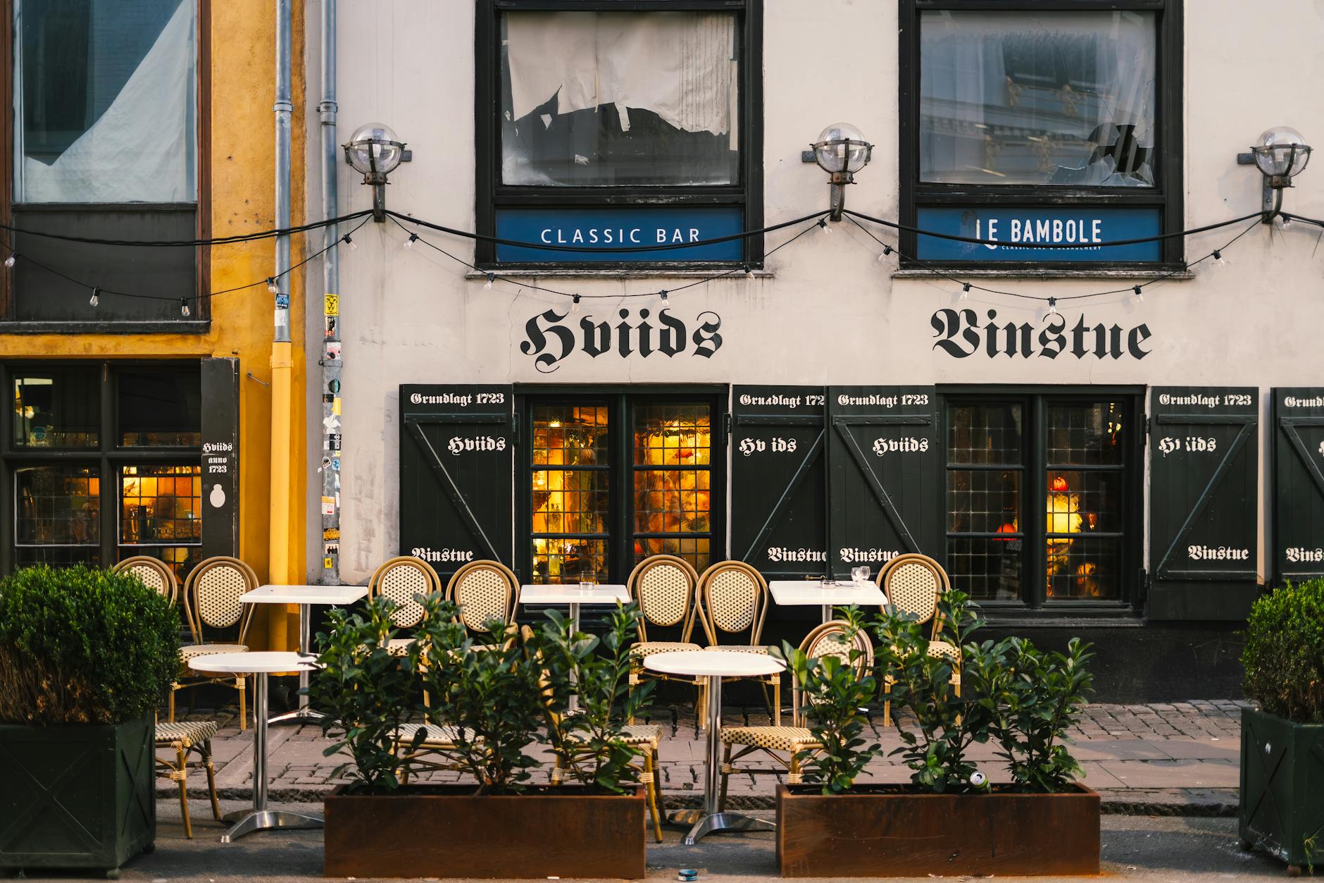 Historic Copenhagen bar seating for sales client meal planning.