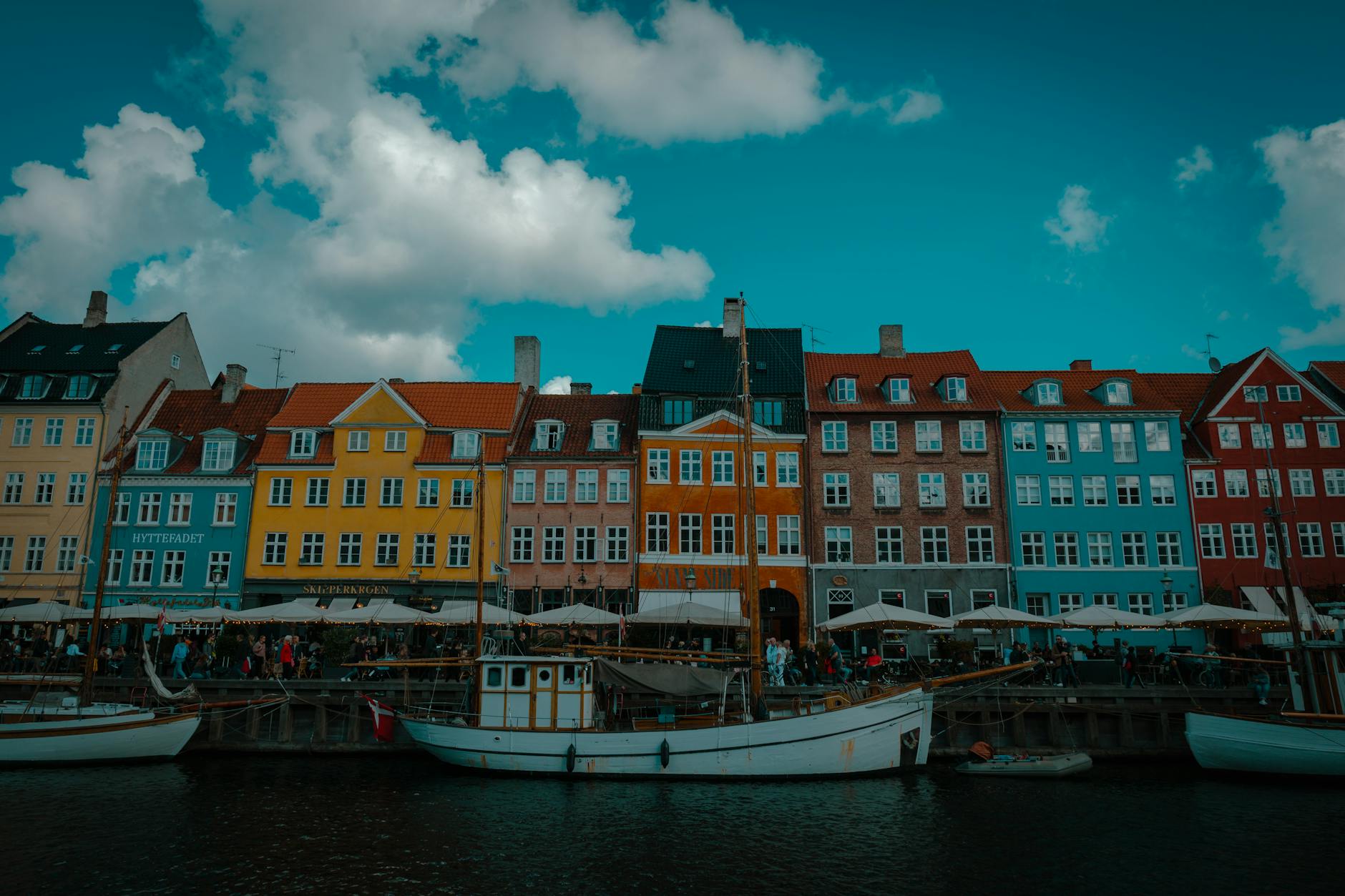 Boats and buildings along Nyhavn canal for Copenhagen water planning.