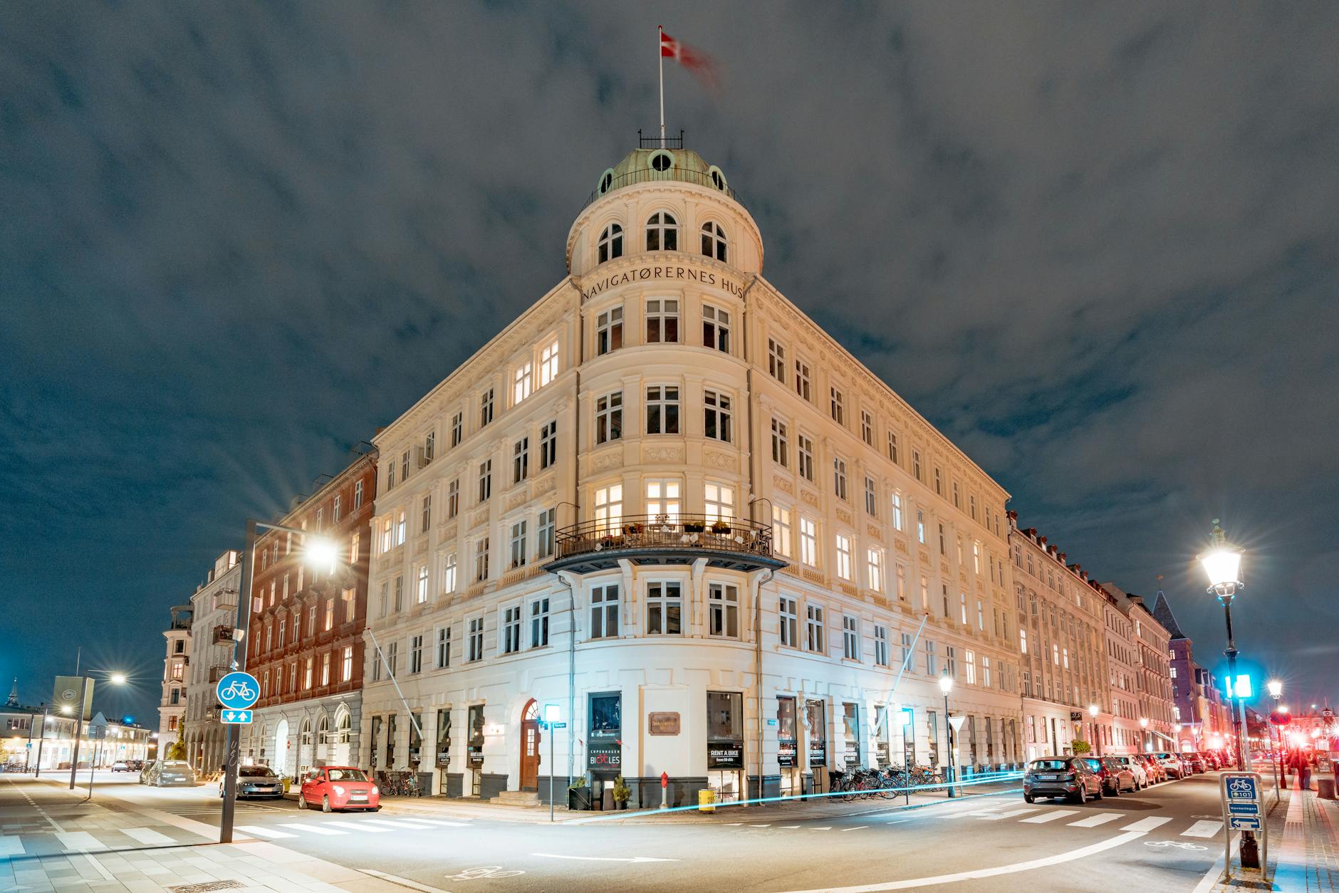 Illuminated Copenhagen building for trade-show hotel planning.
