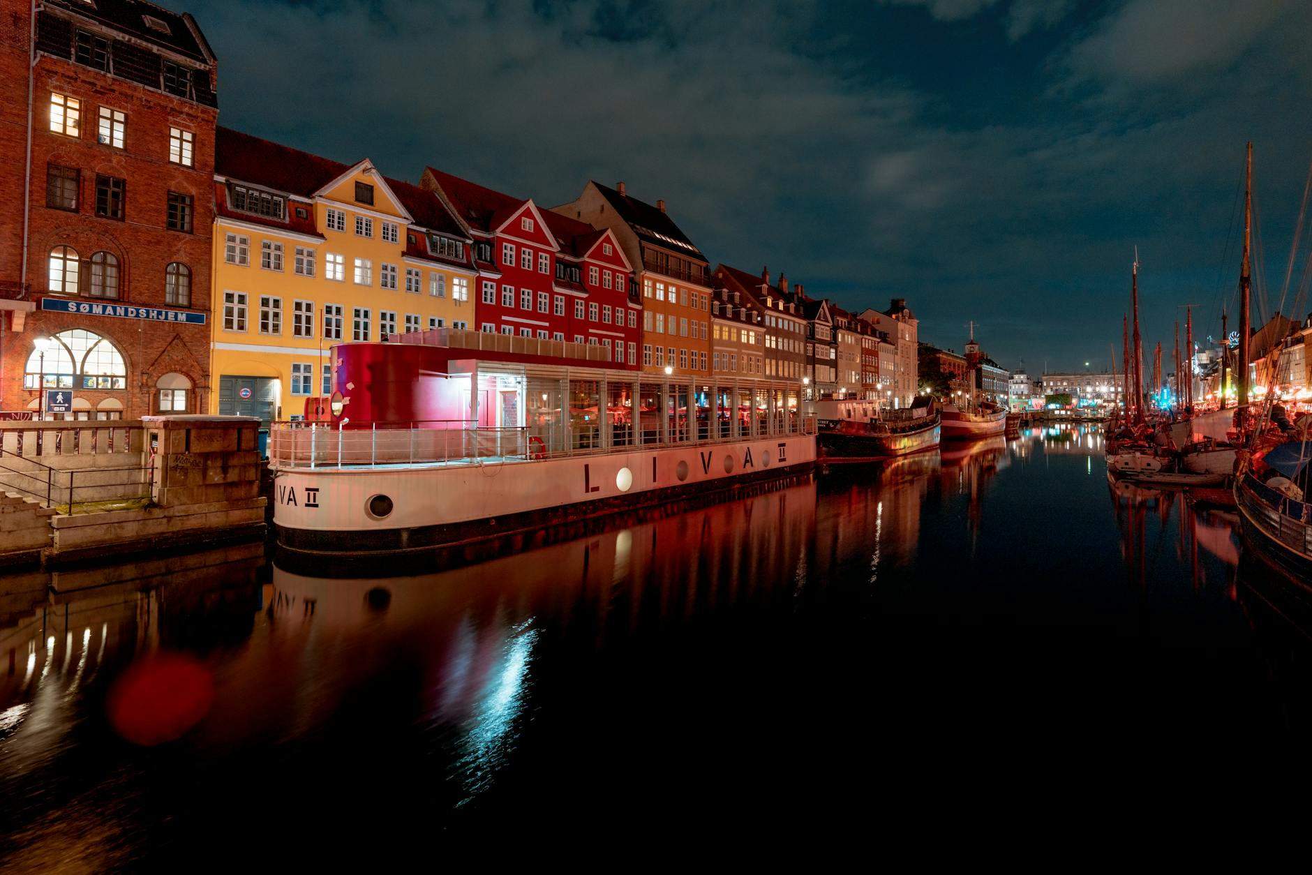 Nyhavn at night for Copenhagen trade-show dinner planning.