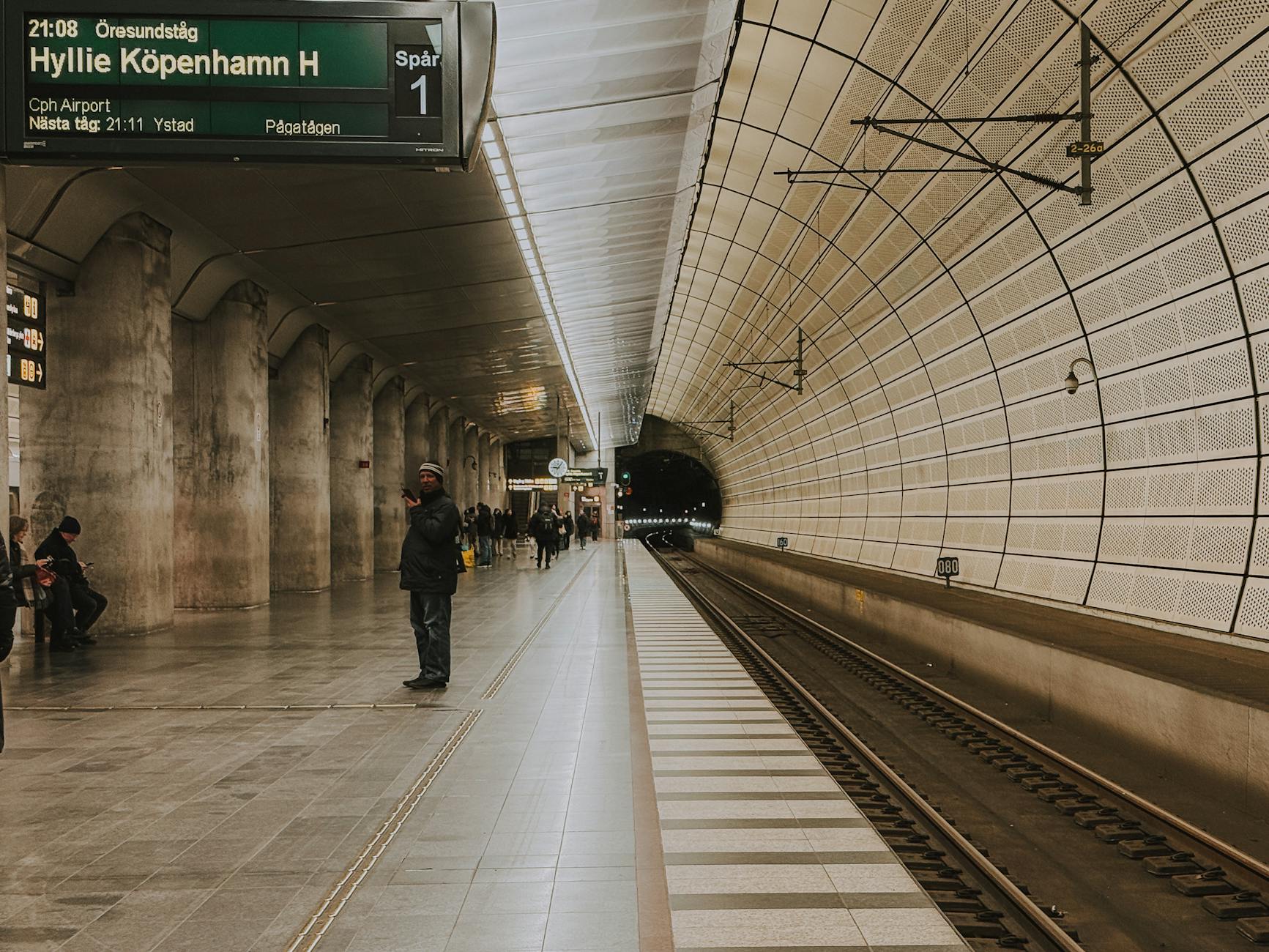 Station platform for travelers connecting onward to Copenhagen.
