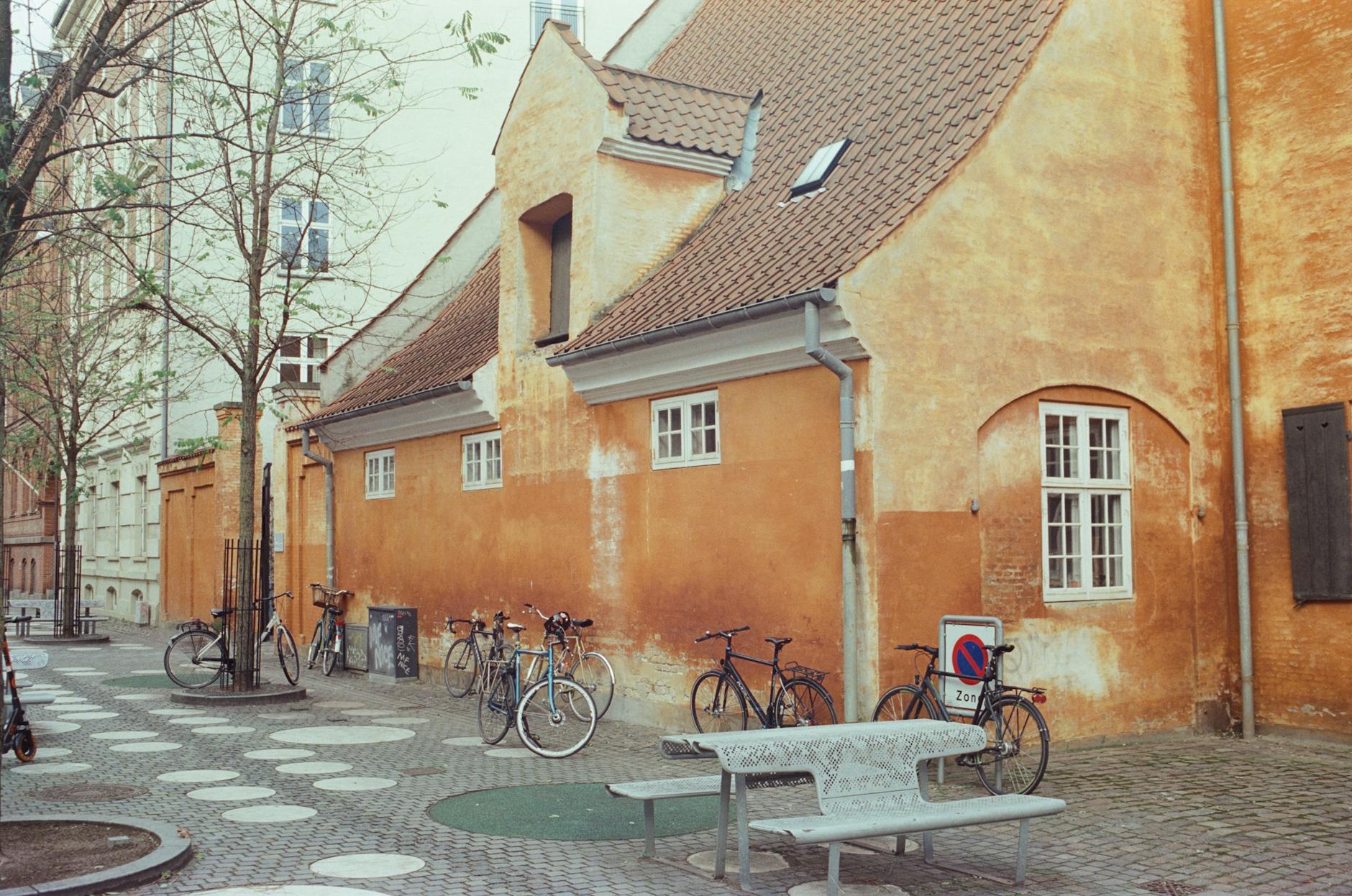 Quiet Copenhagen street for pharmacy and care planning.