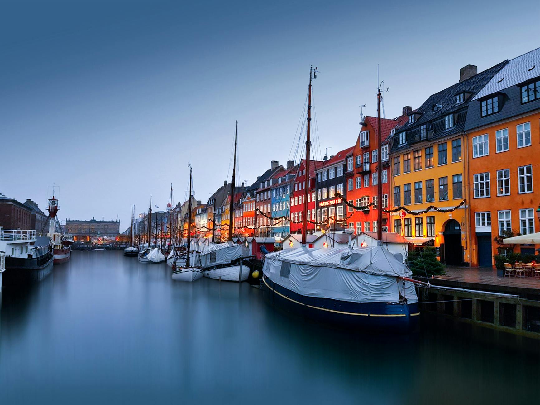Nyhavn at dusk in Copenhagen for volunteer travel report planning.