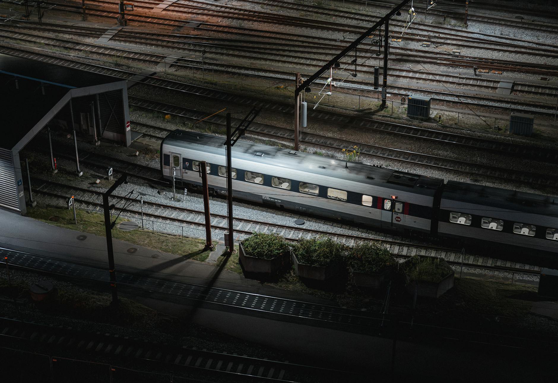 Night train tracks in Copenhagen for arrival and transit planning.