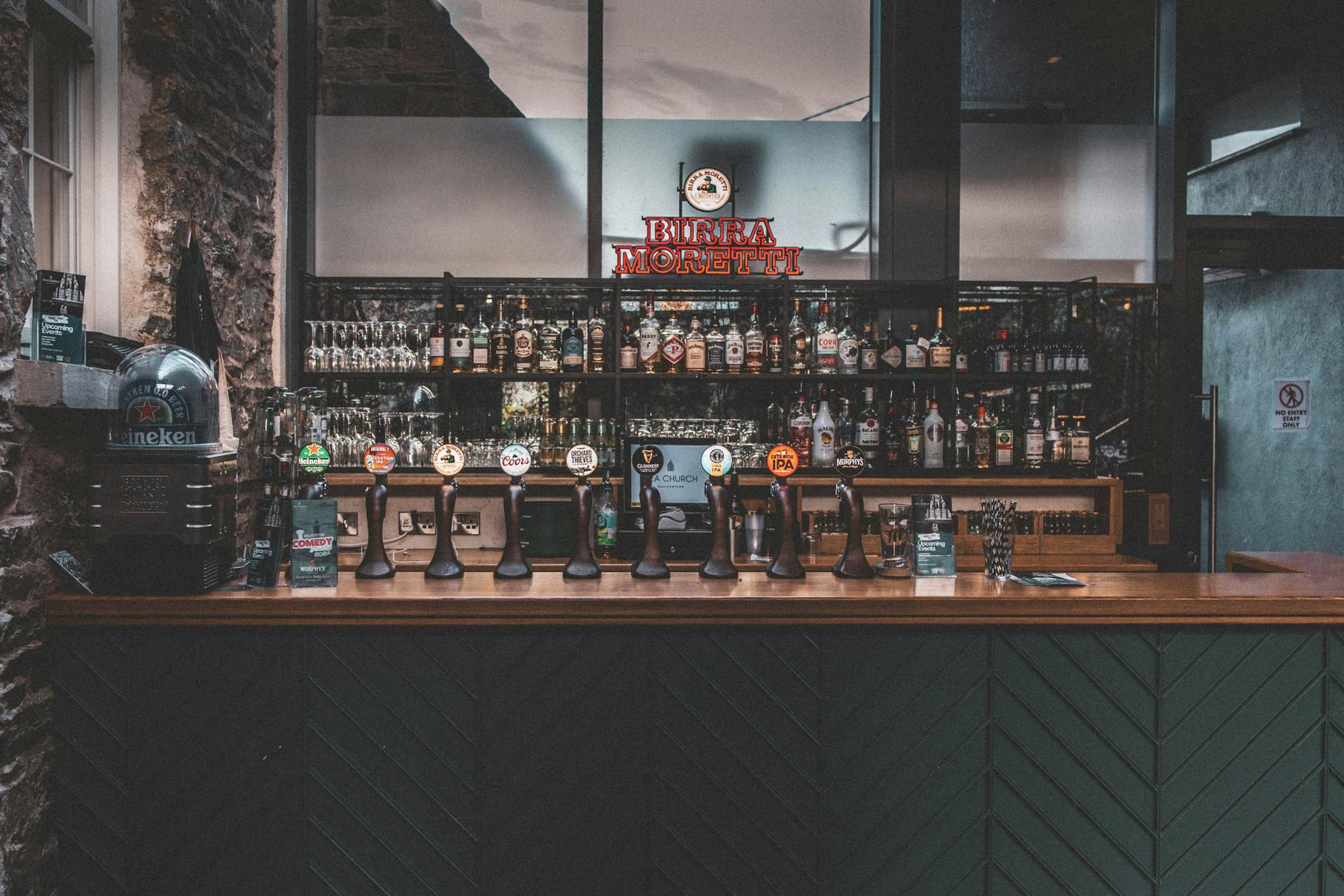 Warm and inviting Irish pub with a rustic bar setup in Ballycotton, County Cork.