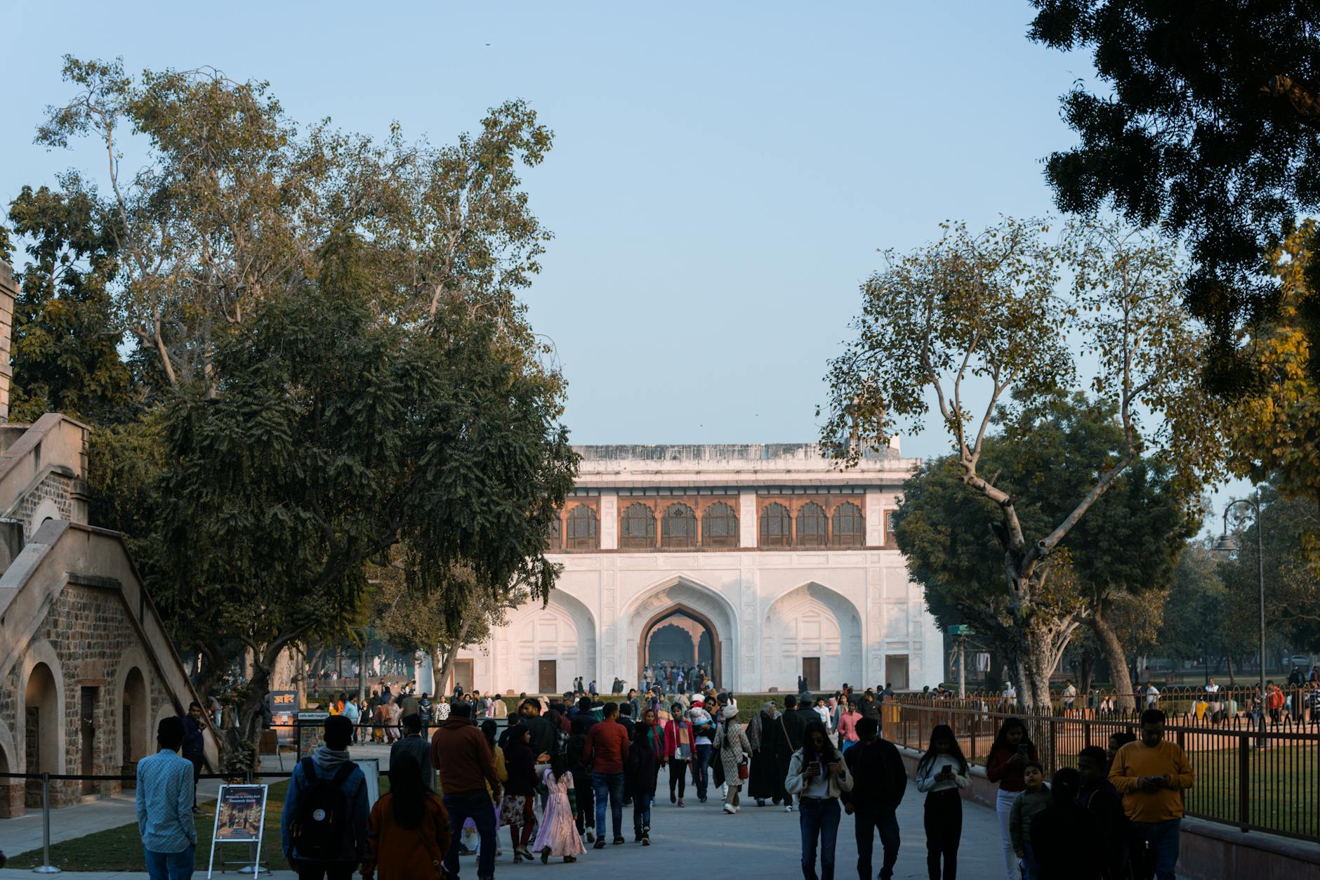 Visitors exploring a historic square in Delhi for first-time trip planning.