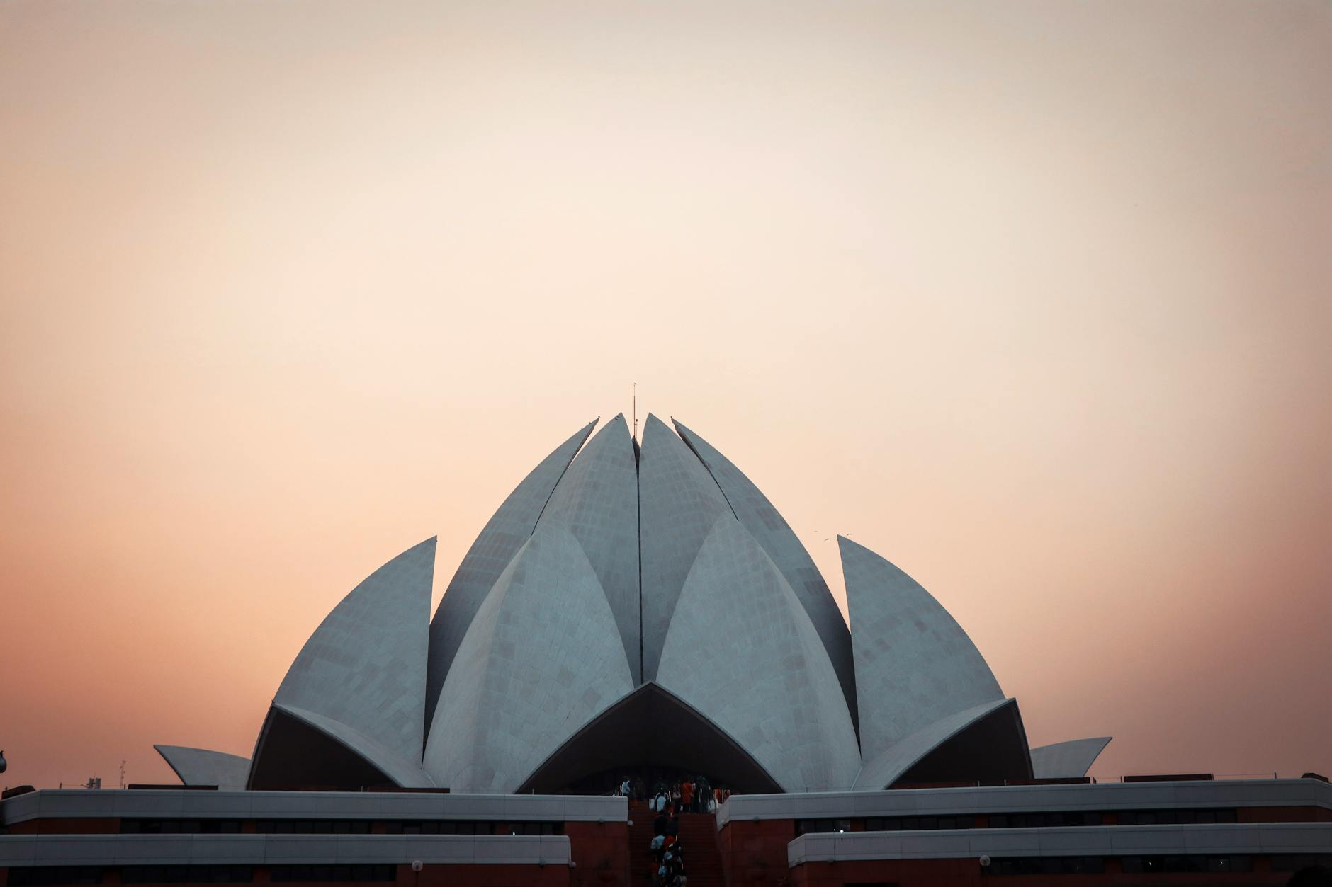 Lotus Temple at sunset in New Delhi for luxury travel report planning.