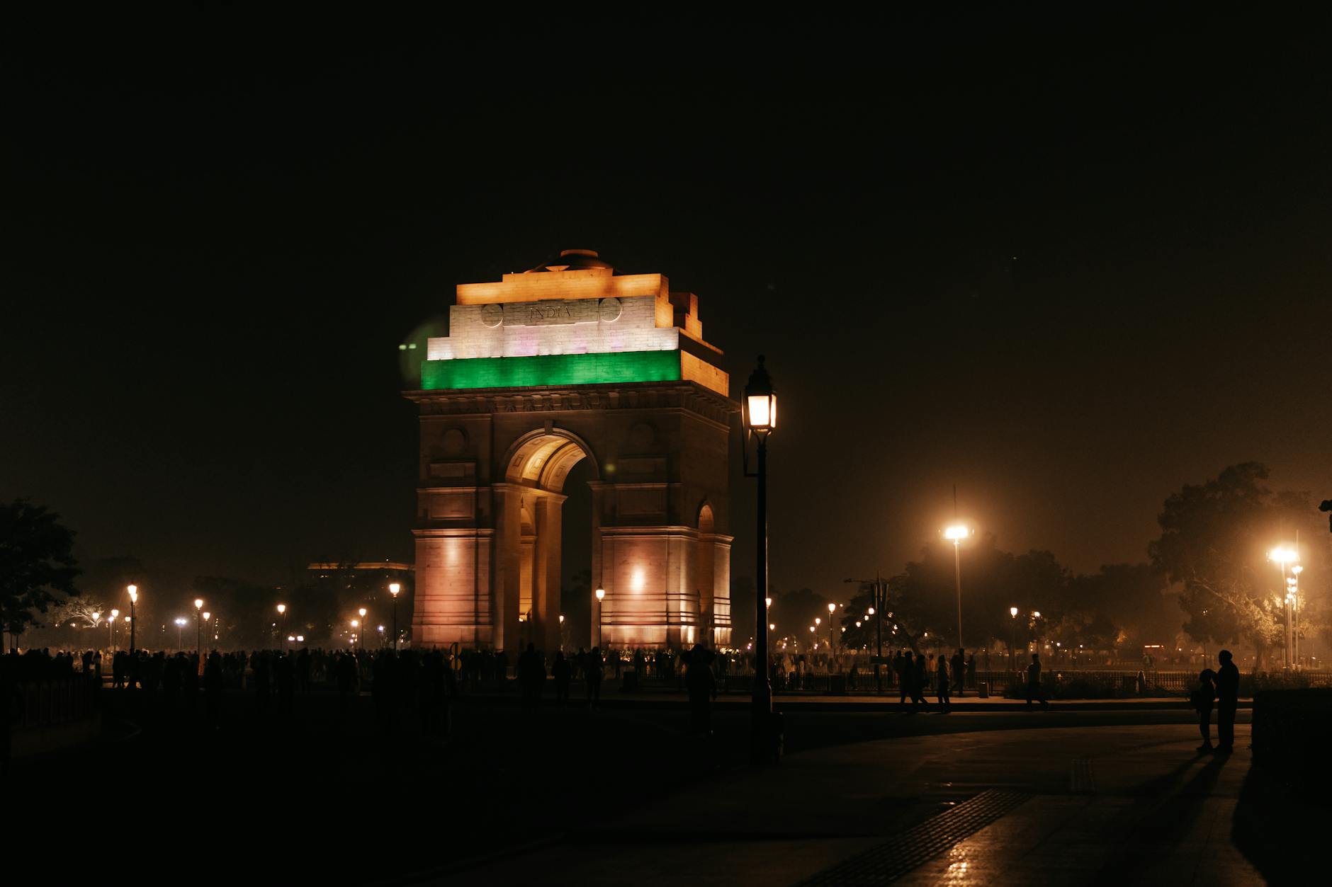 Illuminated India Gate at night for solo Delhi evening planning.