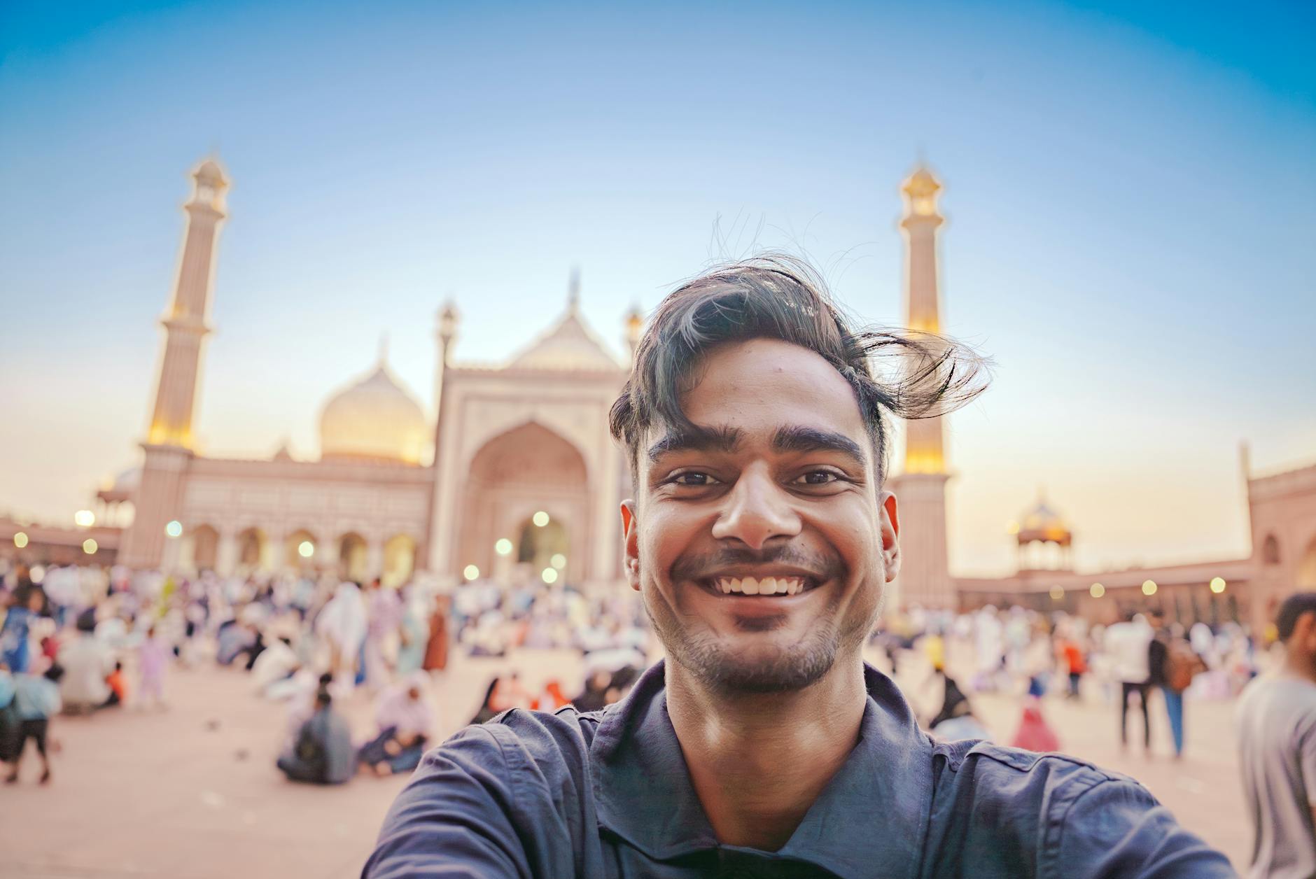 Solo traveler taking a selfie at Jama Masjid in Old Delhi.