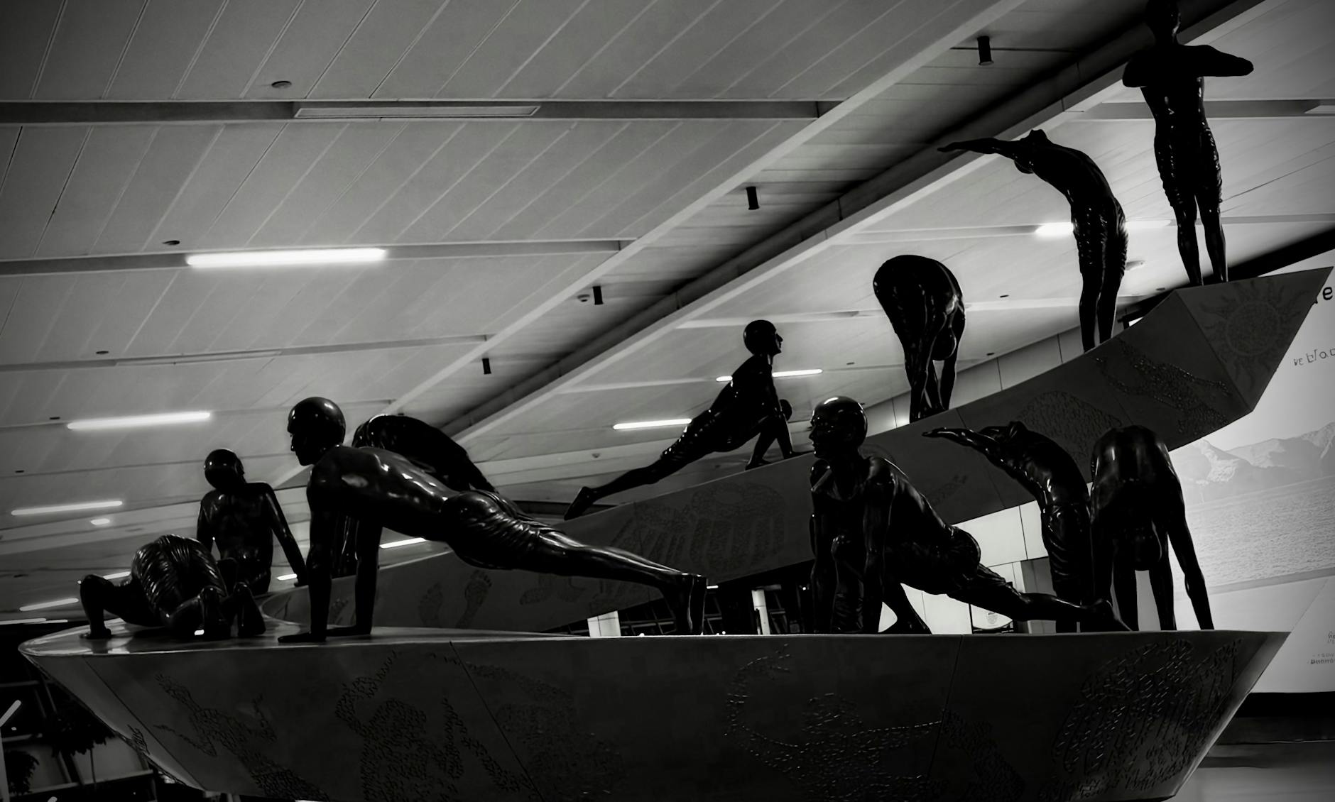 Indoor sculpture display at Delhi airport for arrival planning.