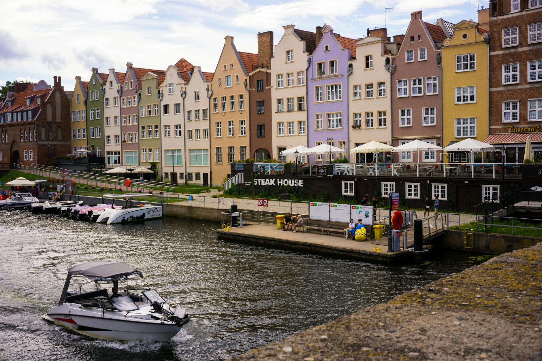 Gdansk restaurant and waterfront setting for business meal planning.