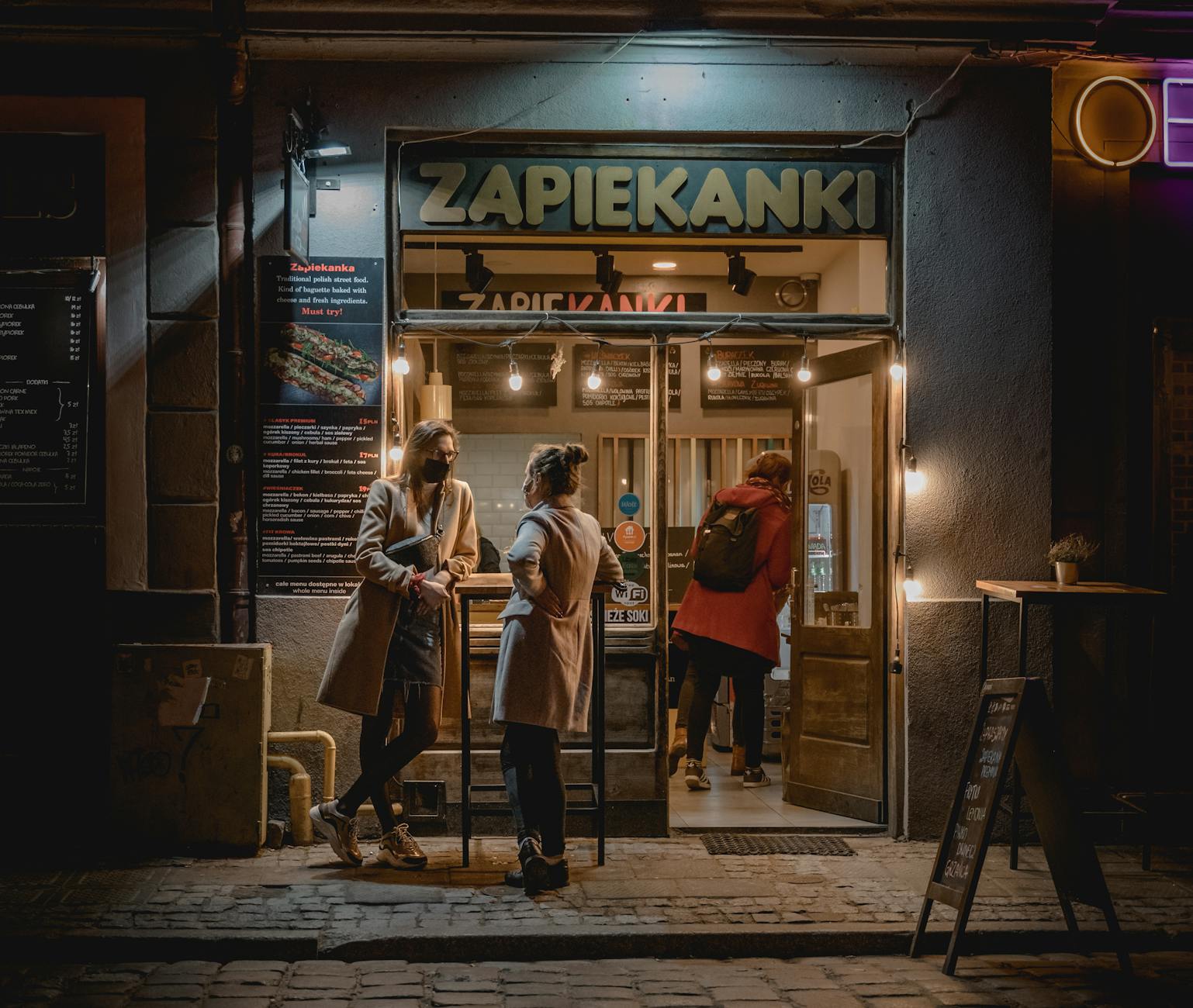 Gdansk evening restaurant setting for nightlife budget planning.