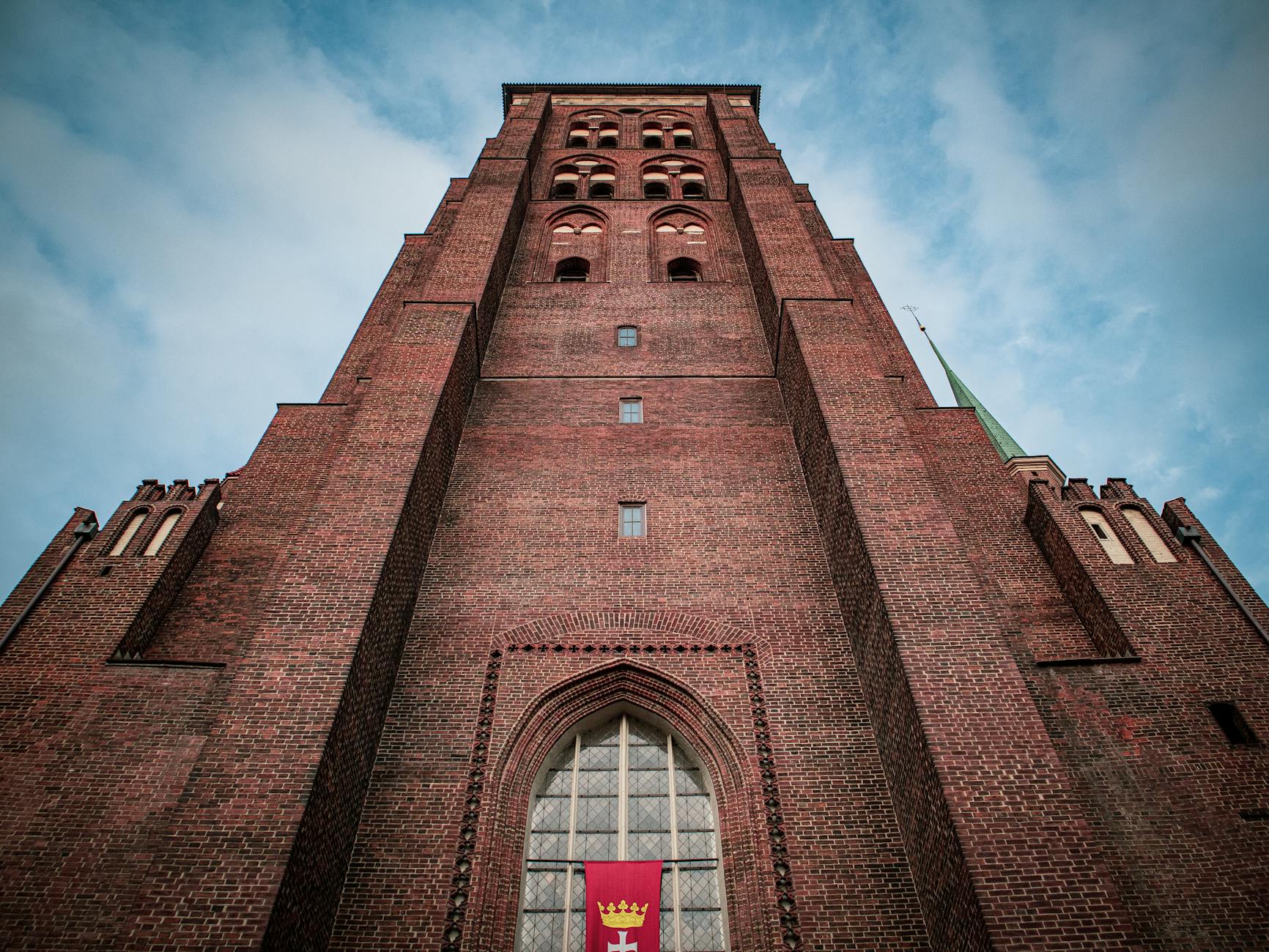 Gdansk church facade for pilgrimage service schedule planning.