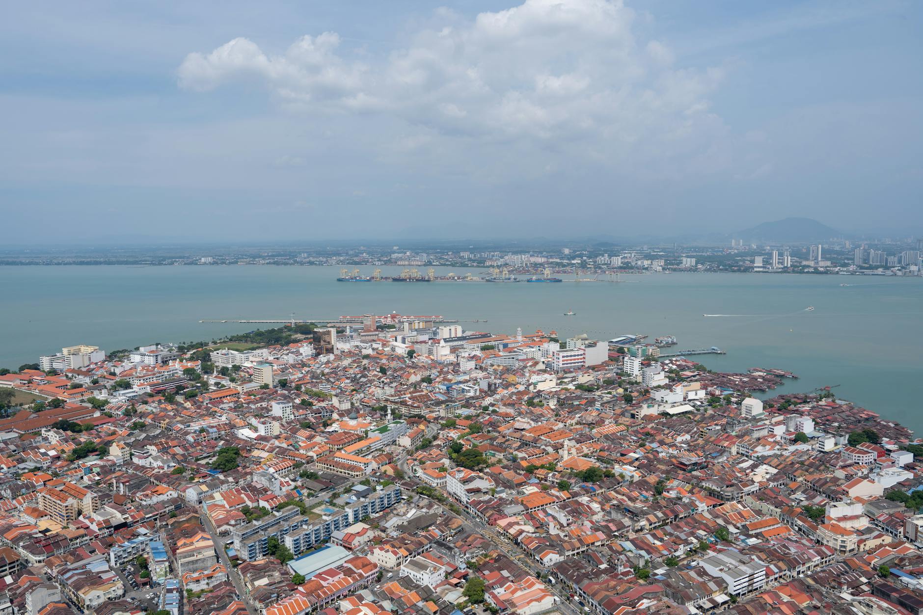 George Town climate and conference movement context.