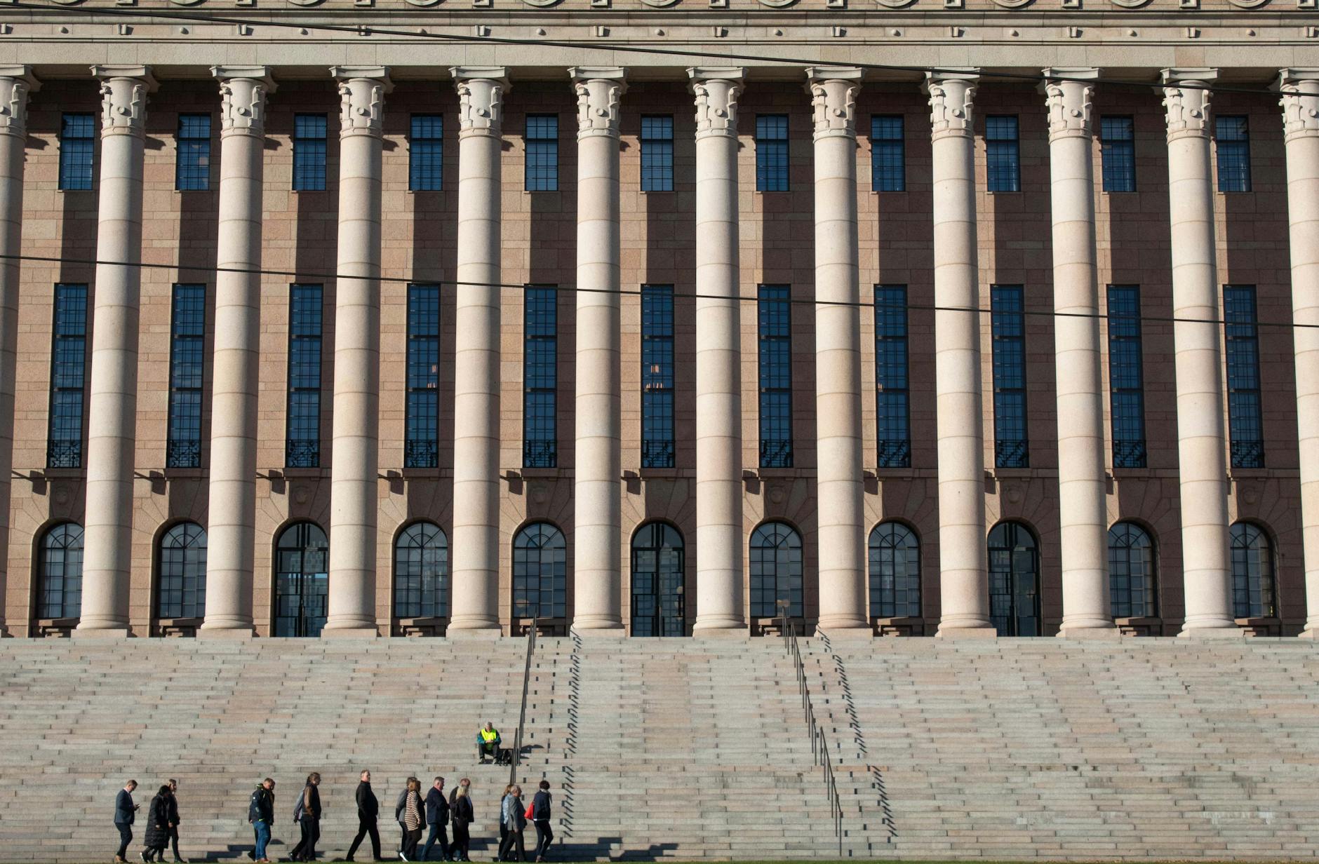 Finnish Parliament House for Helsinki academic travel report planning.