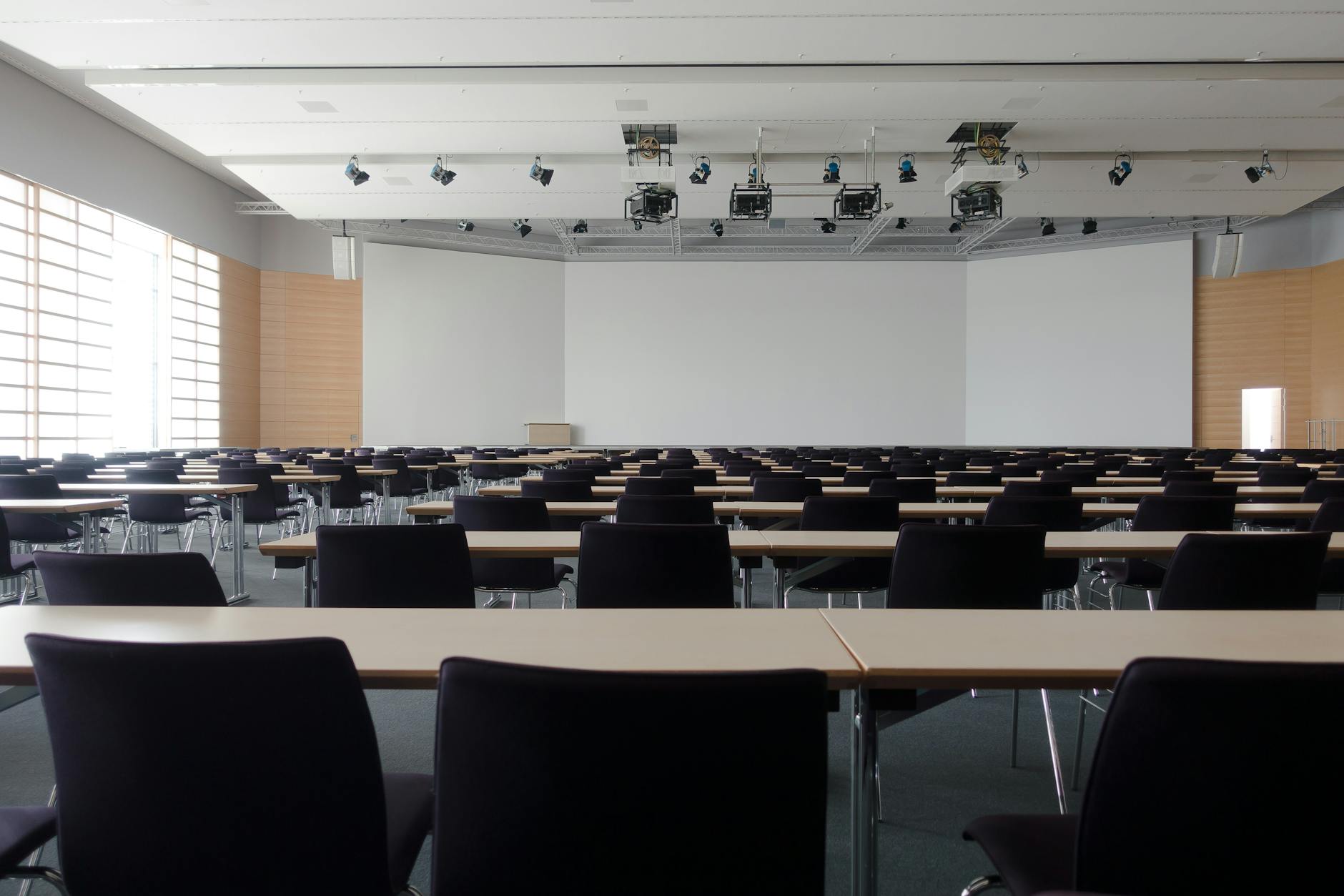 Conference room seating for Helsinki academic lodging planning.