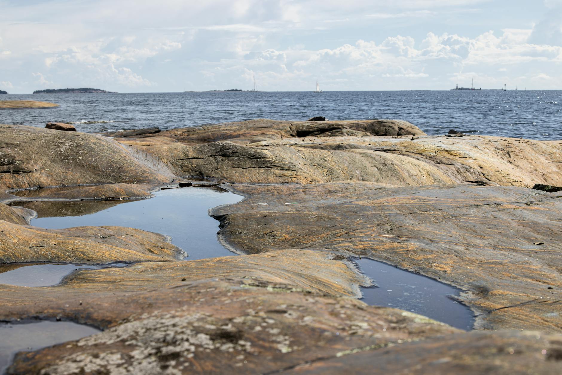 Helsinki rocky coastline for budget meal and route planning.