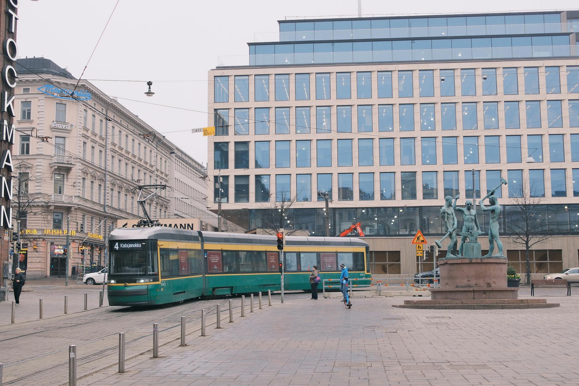 Tram in Helsinki city center for business lodging commute planning.