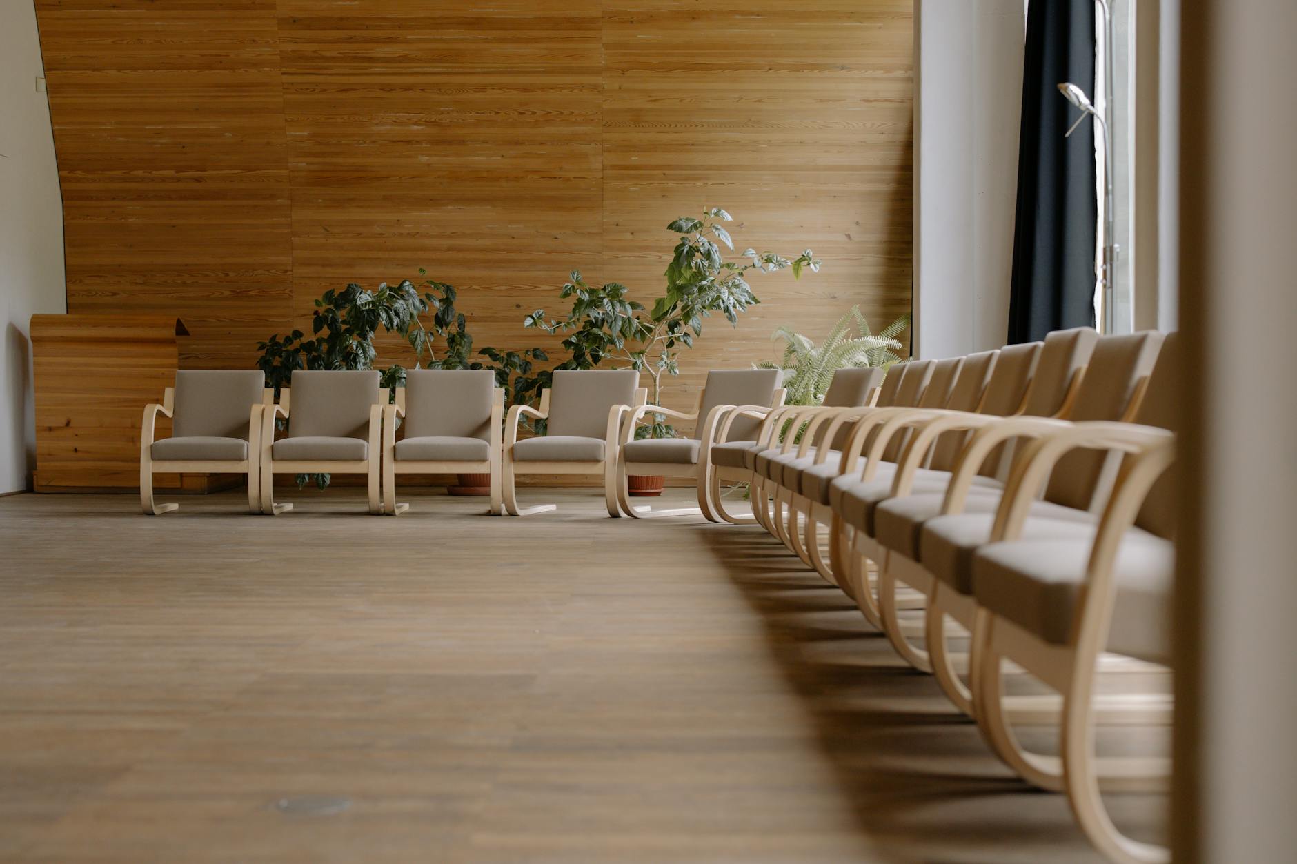 Modern conference hall seating for Helsinki registration planning.