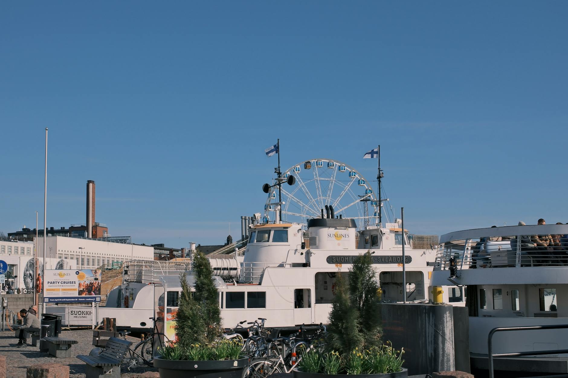 Helsinki harbor and Ferris wheel for family travel report planning.