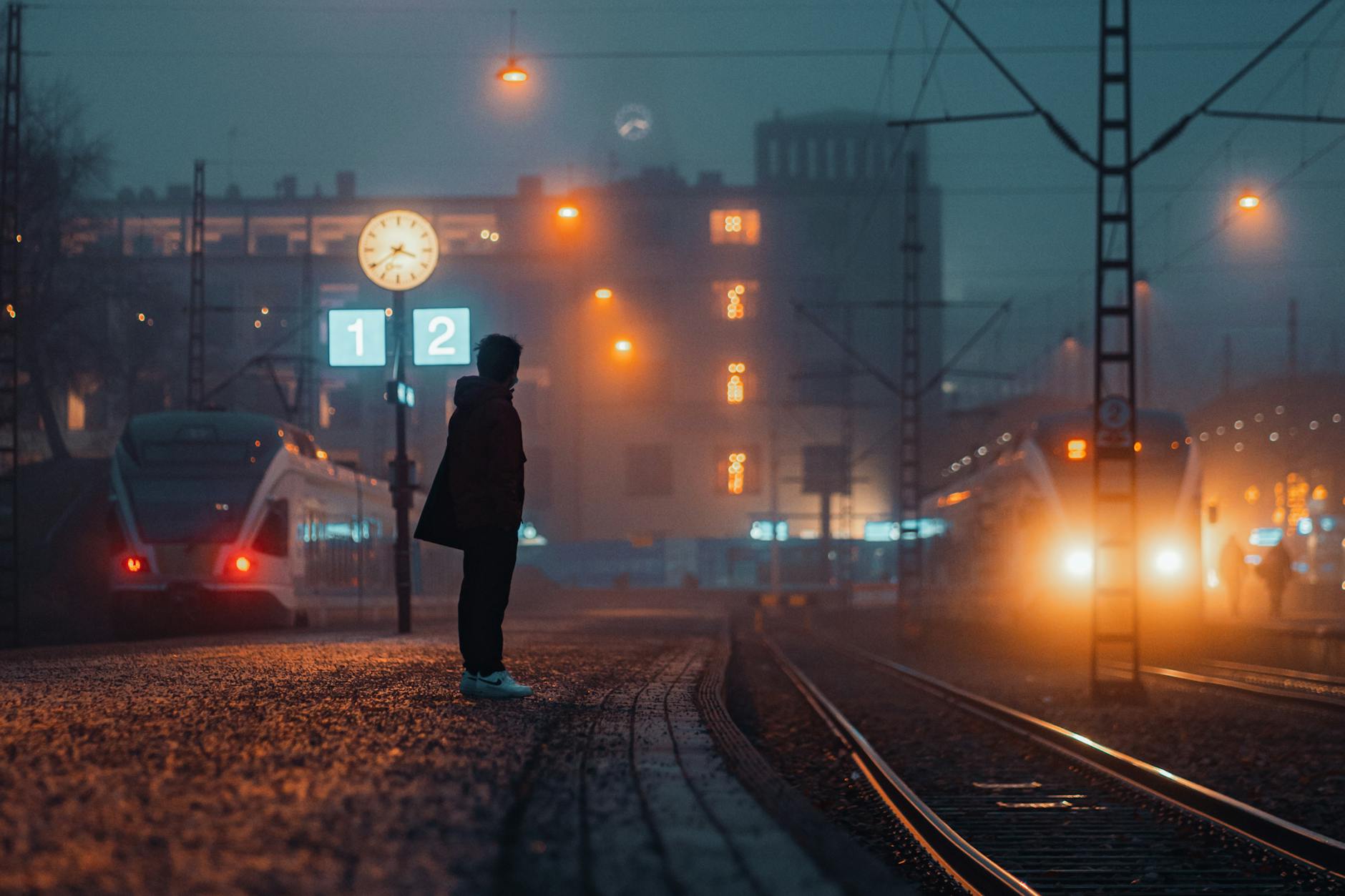 Helsinki train station at night for investor transport planning.