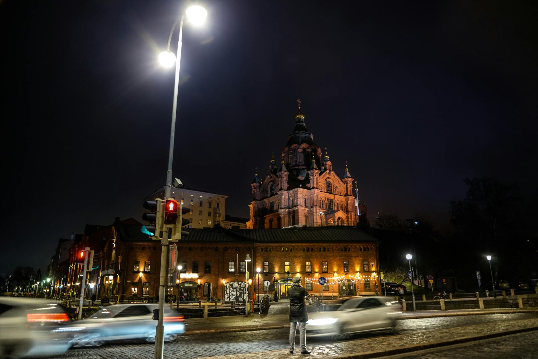 Uspenski Cathedral at night in Helsinki for journalist assignment planning.