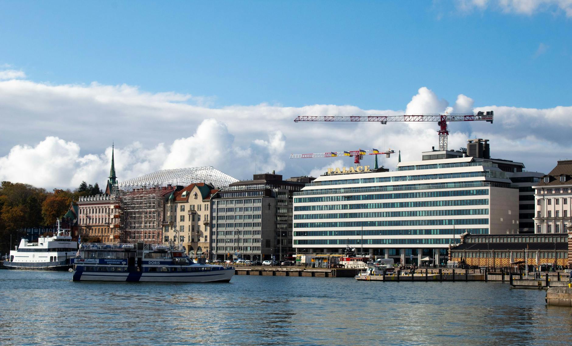 Helsinki harbor and waterfront buildings for luxury travel planning.