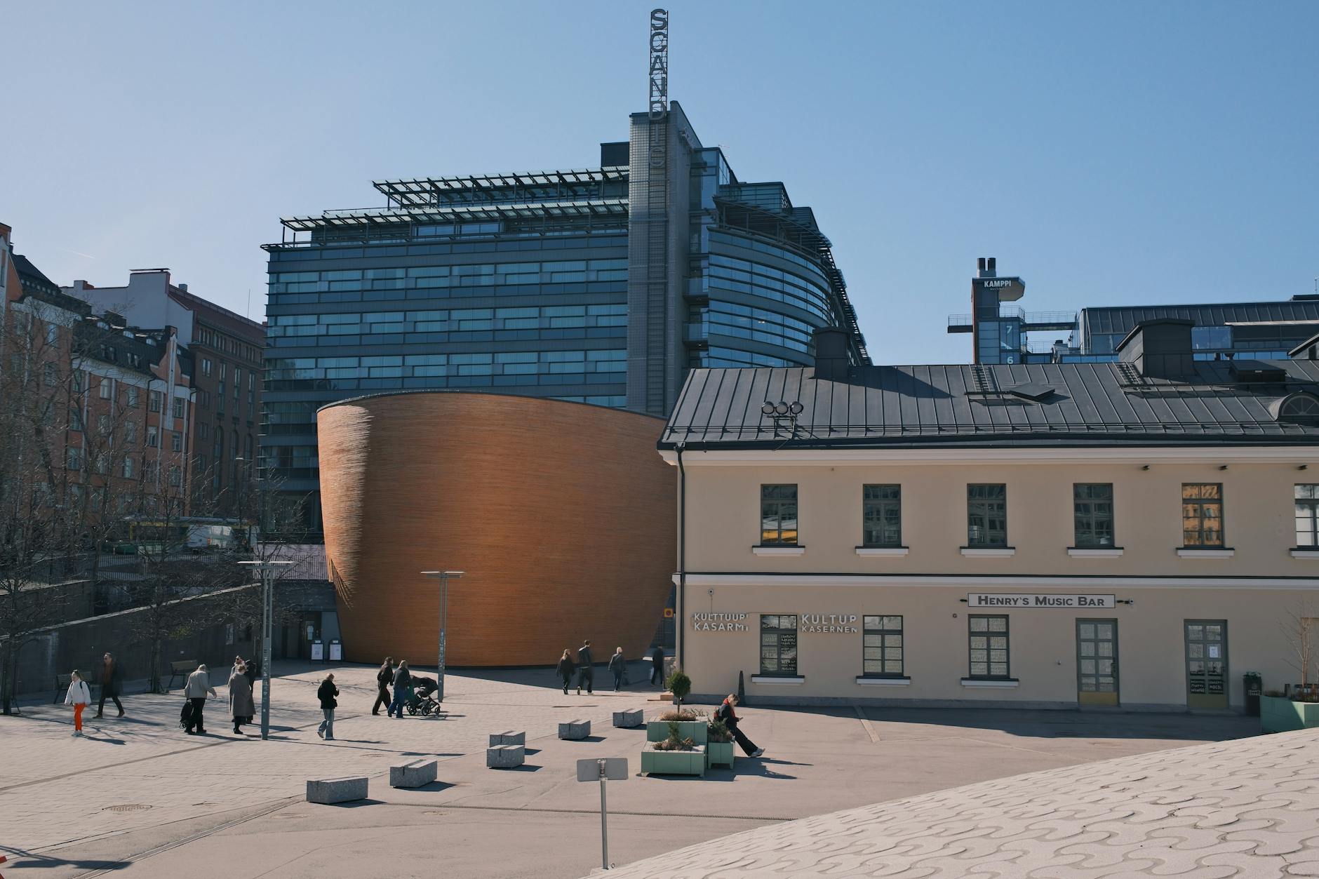 Modern Kamppi architecture in Helsinki for luxury weather-aware routing.