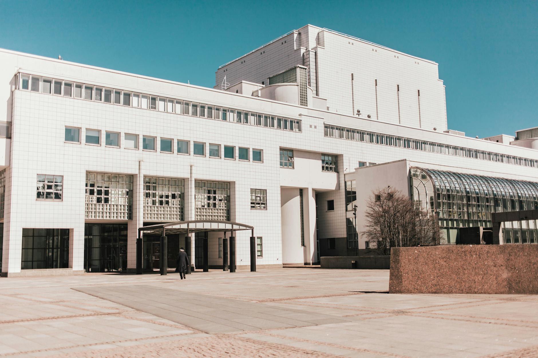 Modern Helsinki building exterior for luxury transfer and service planning.