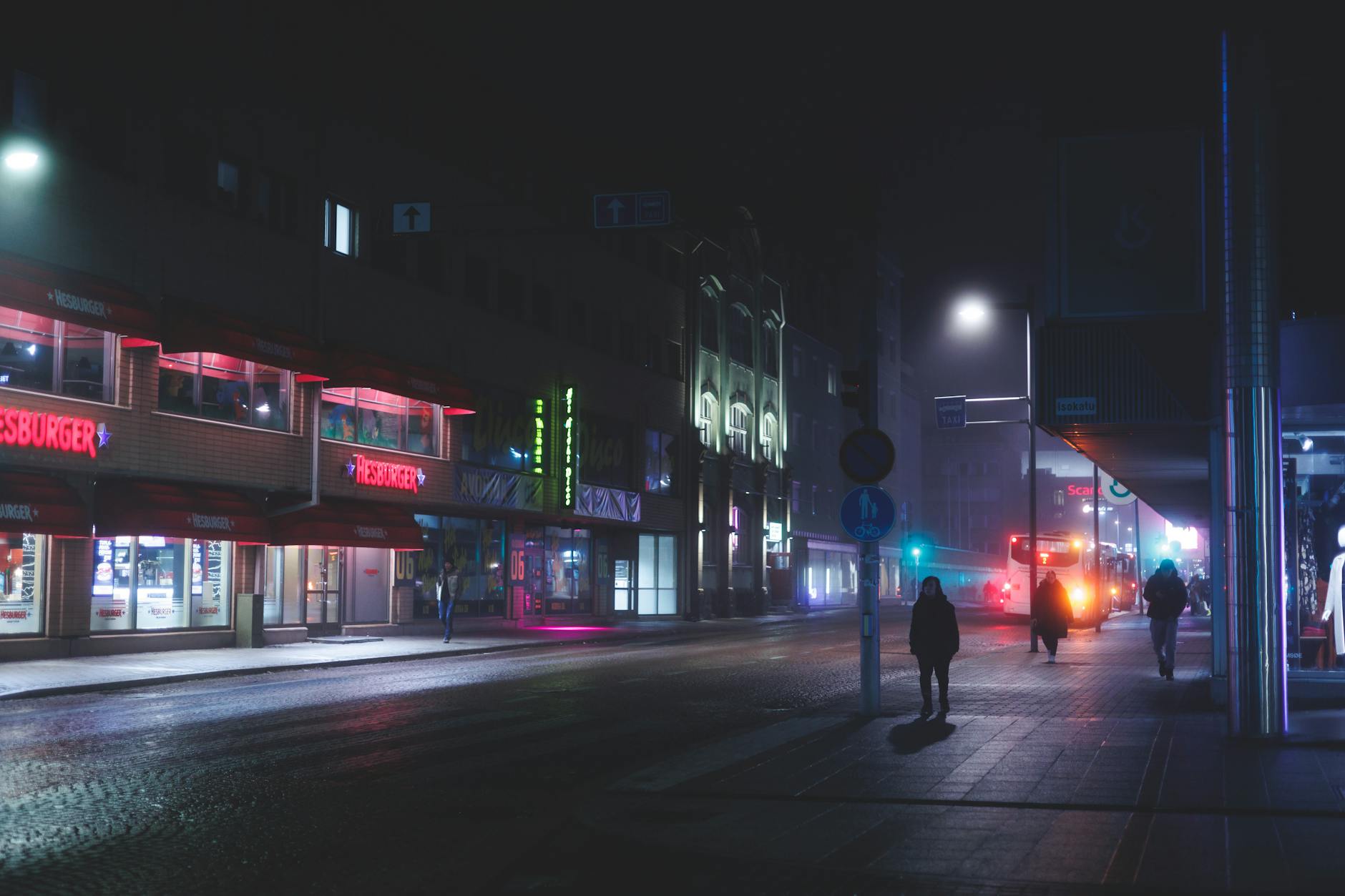 Misty Finnish night street for Helsinki nightlife weather planning.
