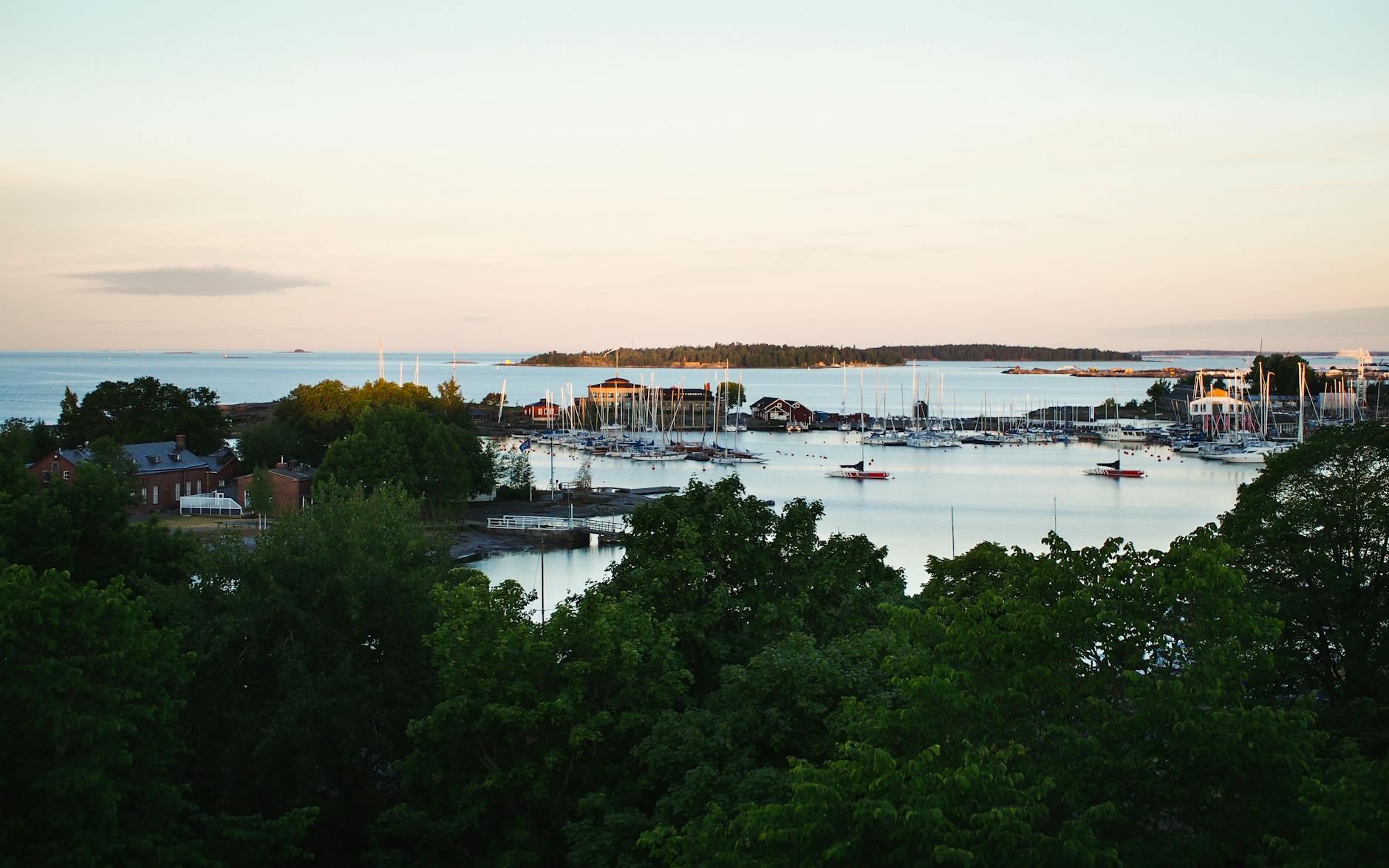 Helsinki harbor at sunrise for repeat leisure departure planning.