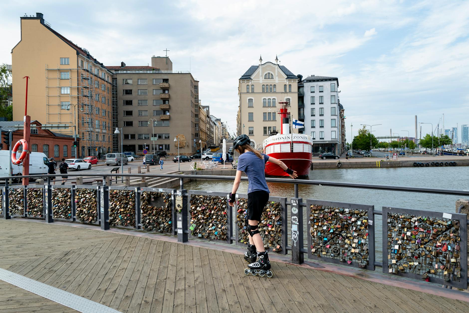 Solo skater near the Helsinki waterfront for personal pacing planning.