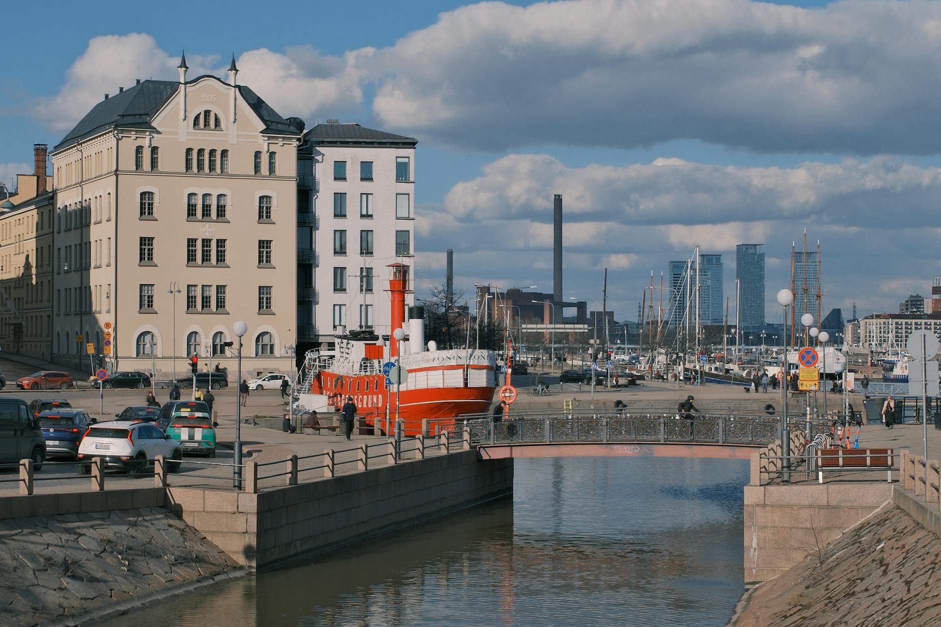 Helsinki waterfront boats and skyline for tourist travel report planning.