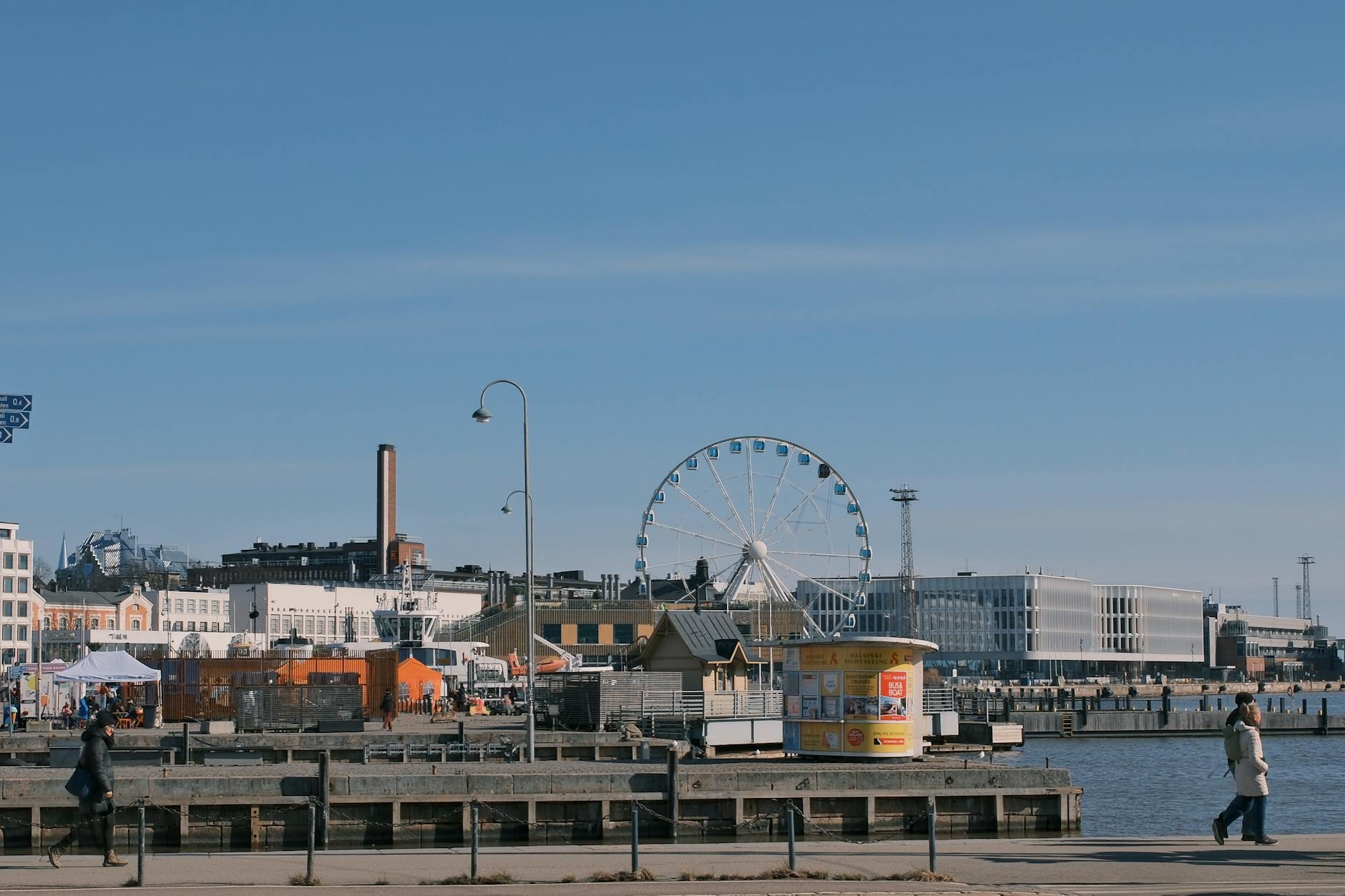 Helsinki waterfront and Ferris wheel for tourist harbor planning.