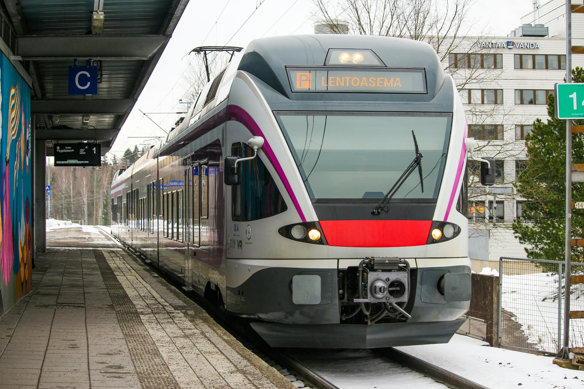 Train at Vantaa station for Helsinki transit planning.